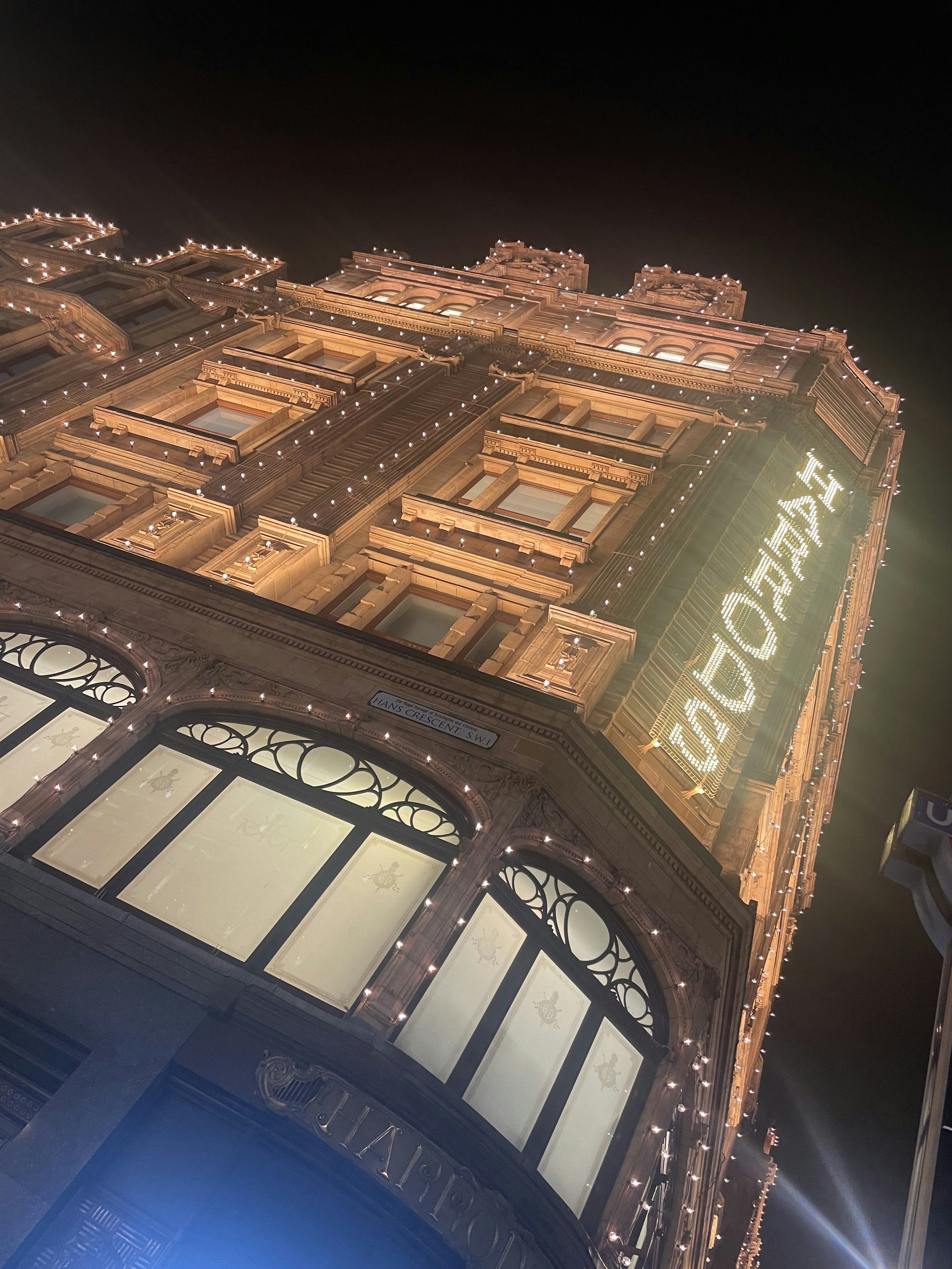 Beautifully decorated building at night with bright lights