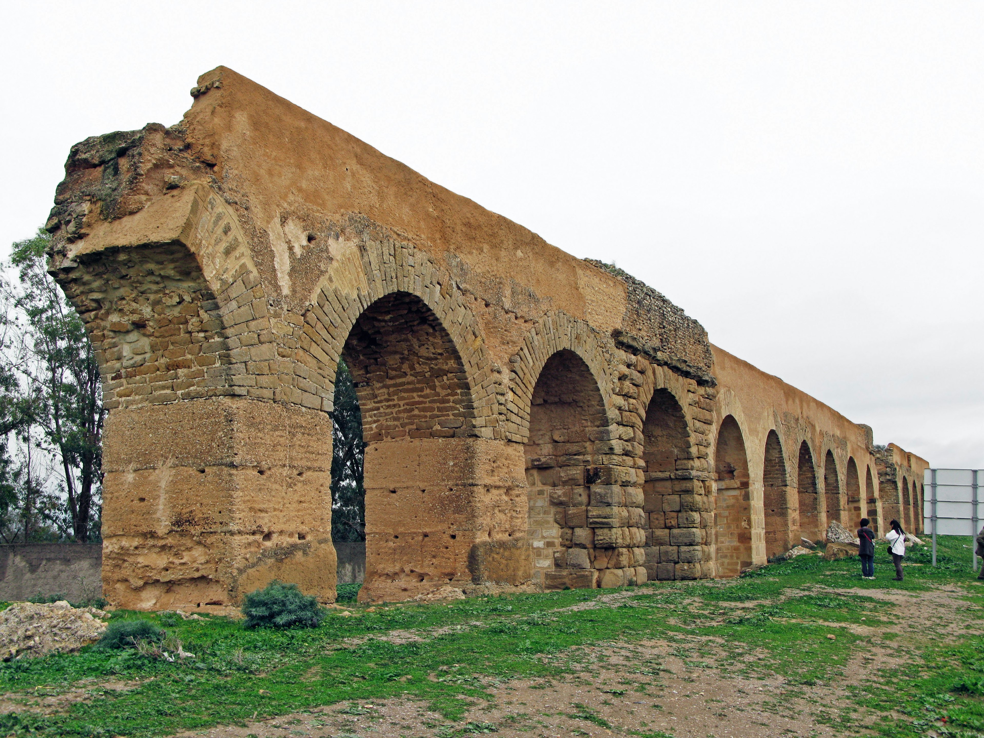 Remains of an ancient aqueduct with arched structures