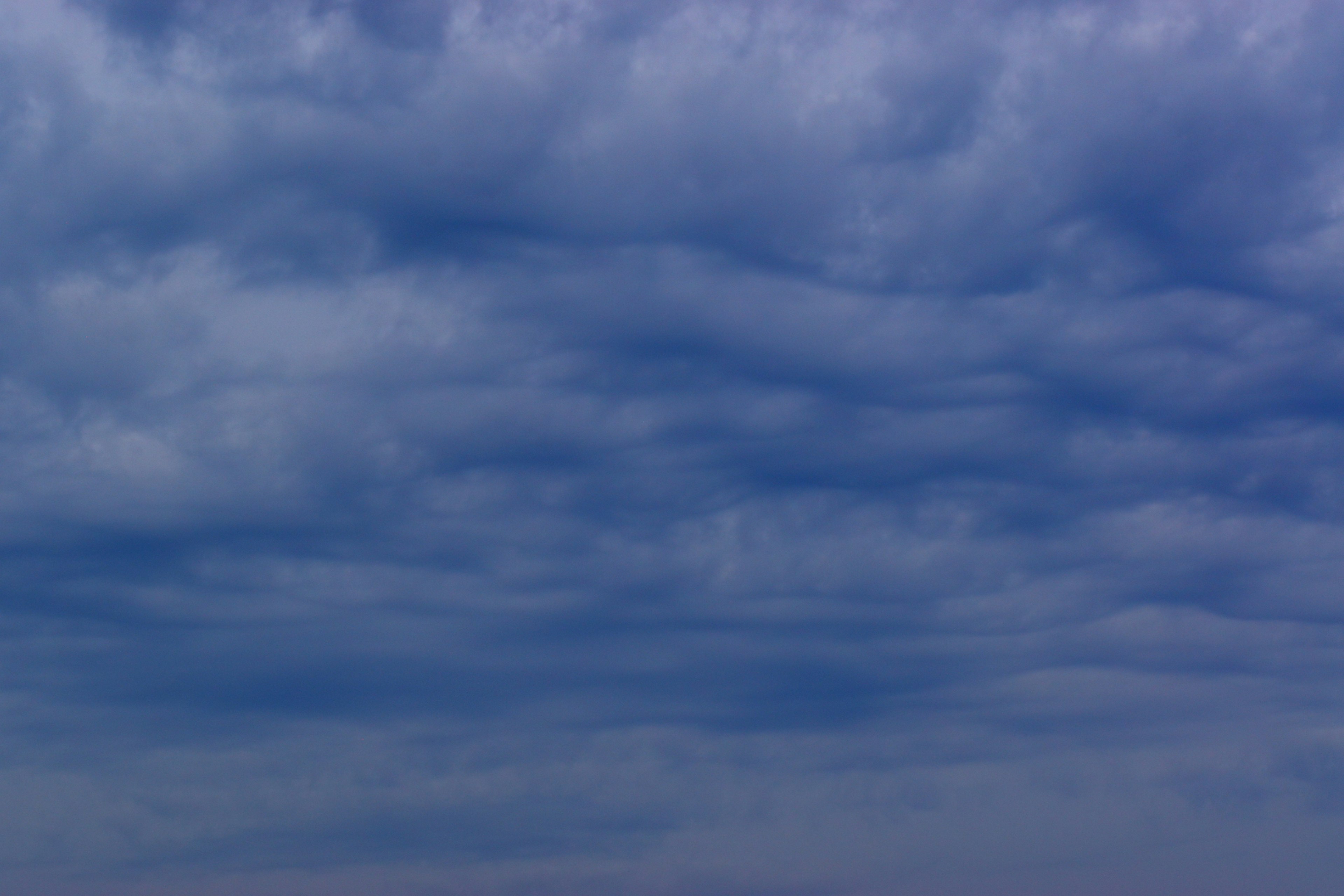 A sky filled with blue clouds