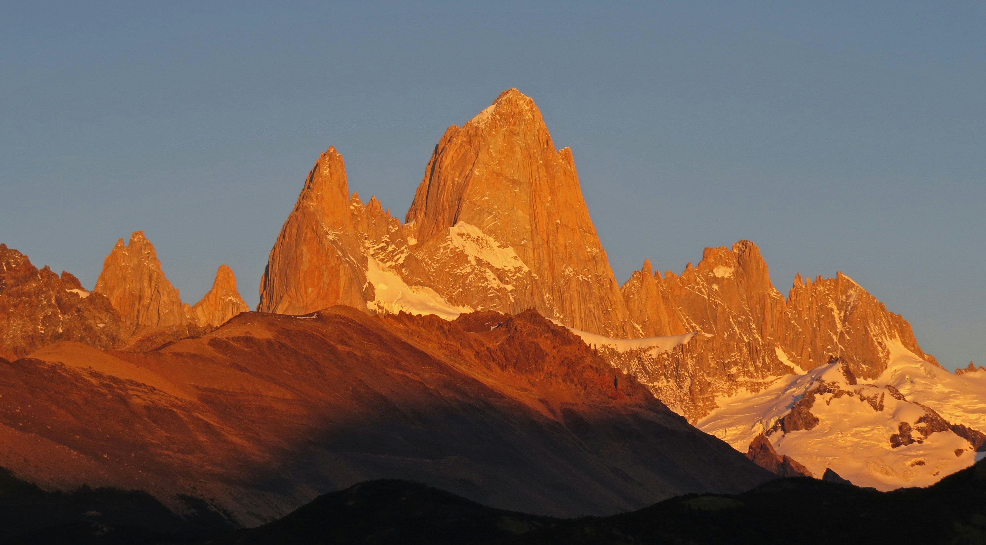 Stunning view of the Paine Peaks illuminated by sunset