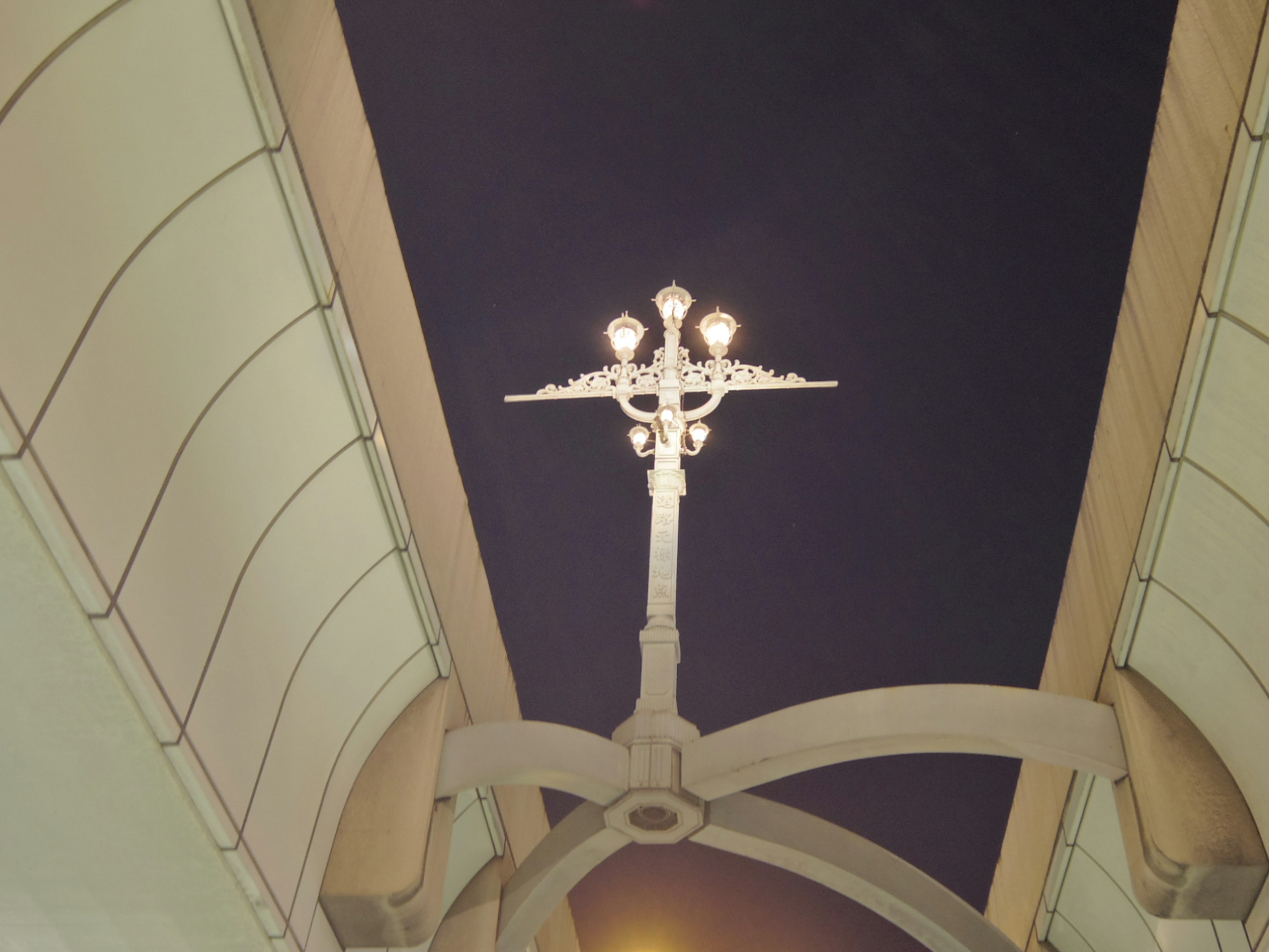 Elegant street lamp design against a night sky