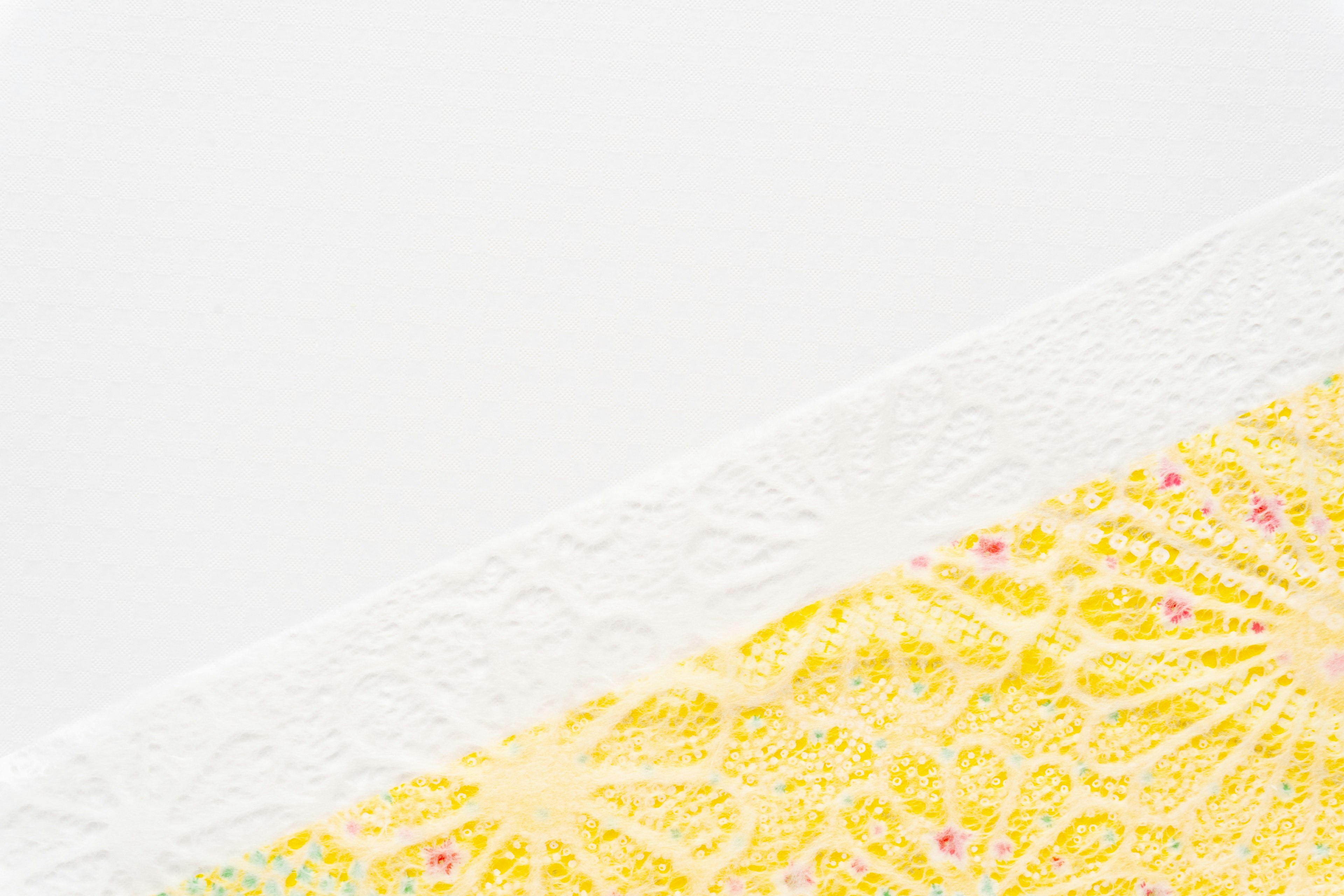 Beautiful design featuring yellow lace pattern on a white background