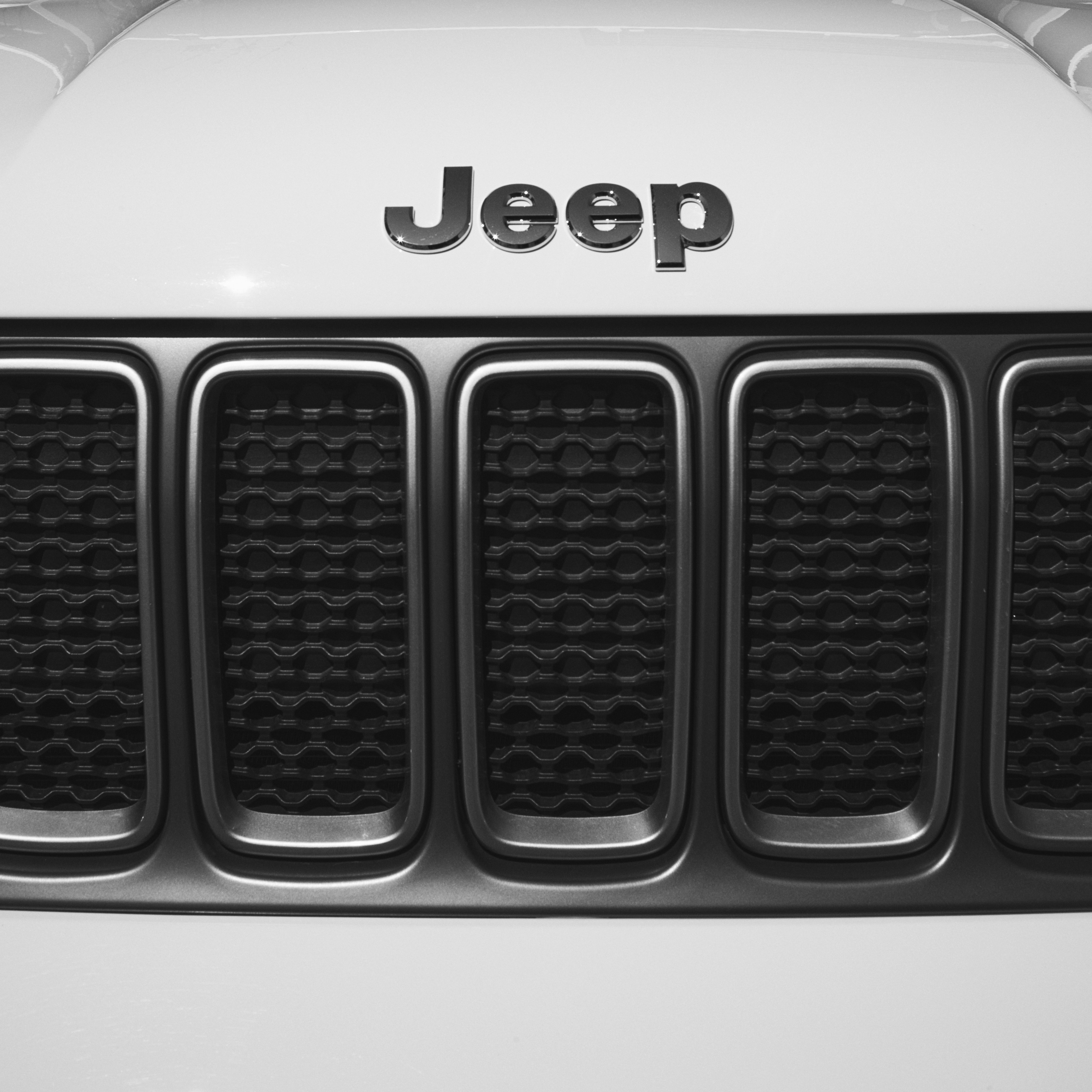 Close-up of Jeep front grille and logo