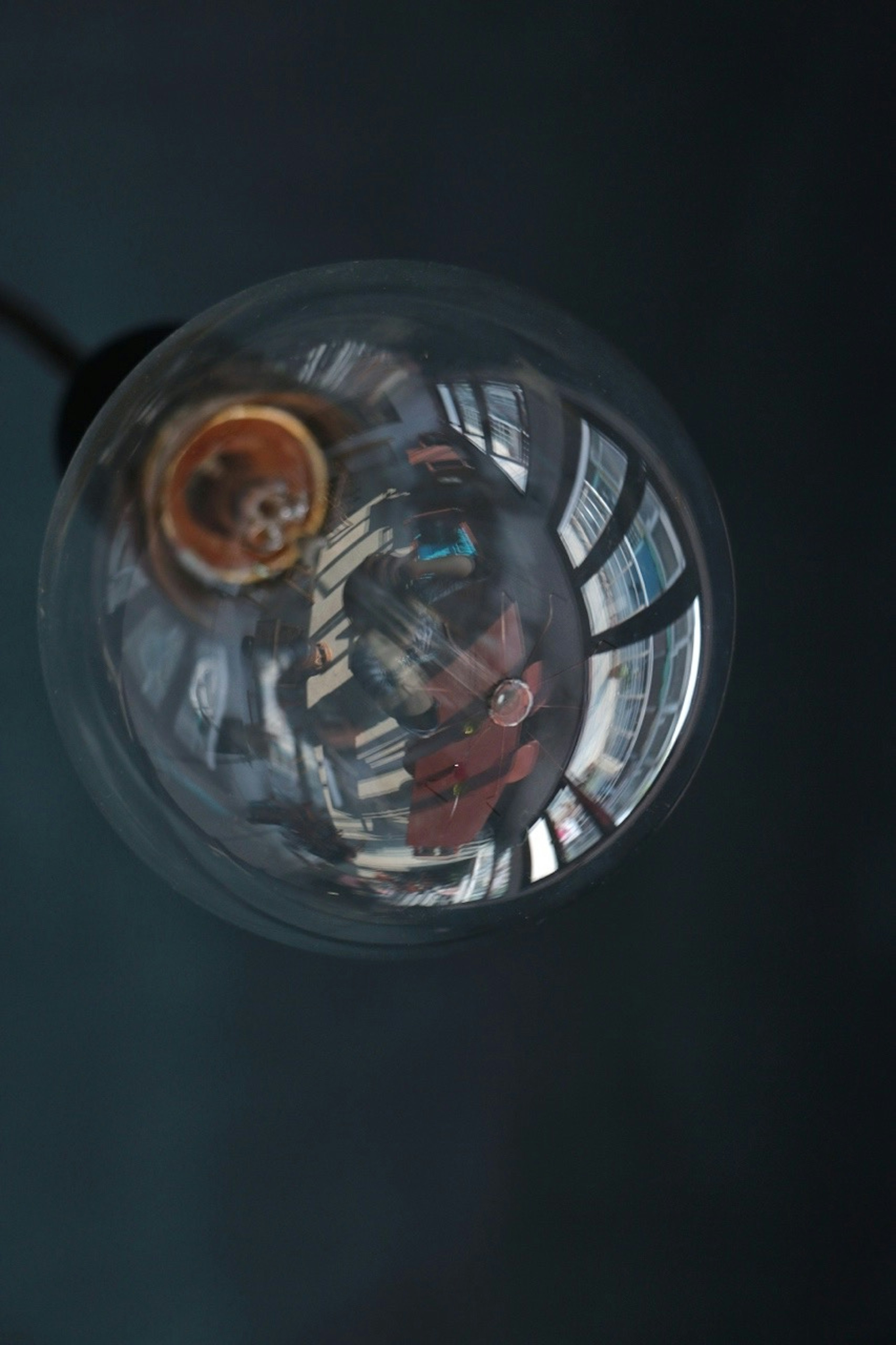 Reflection and colors inside a glass light bulb