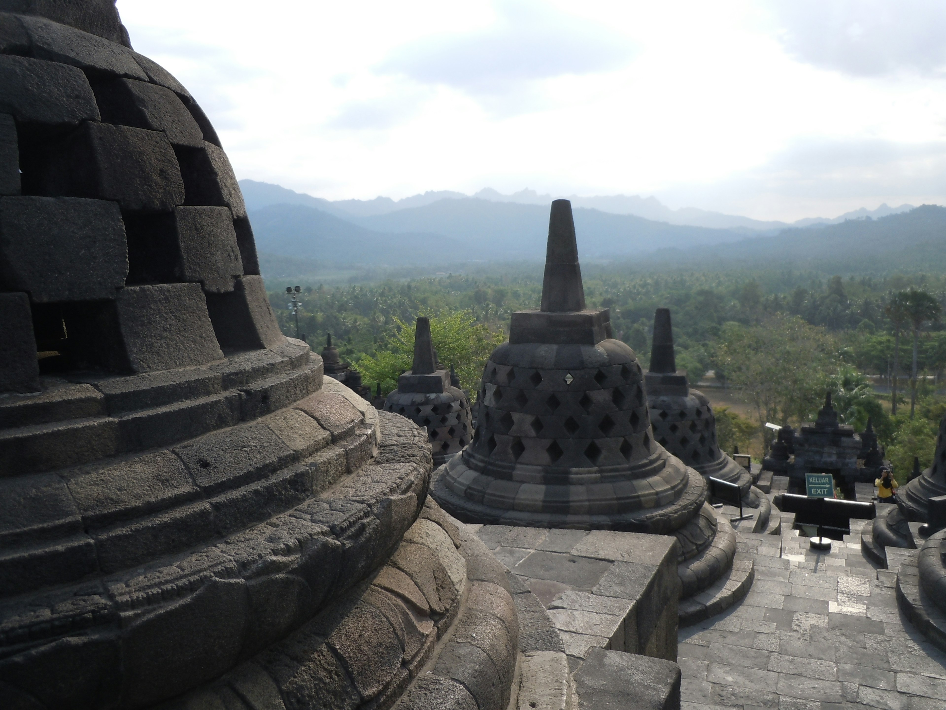 Stupas of Borobudur Temple with surrounding landscape