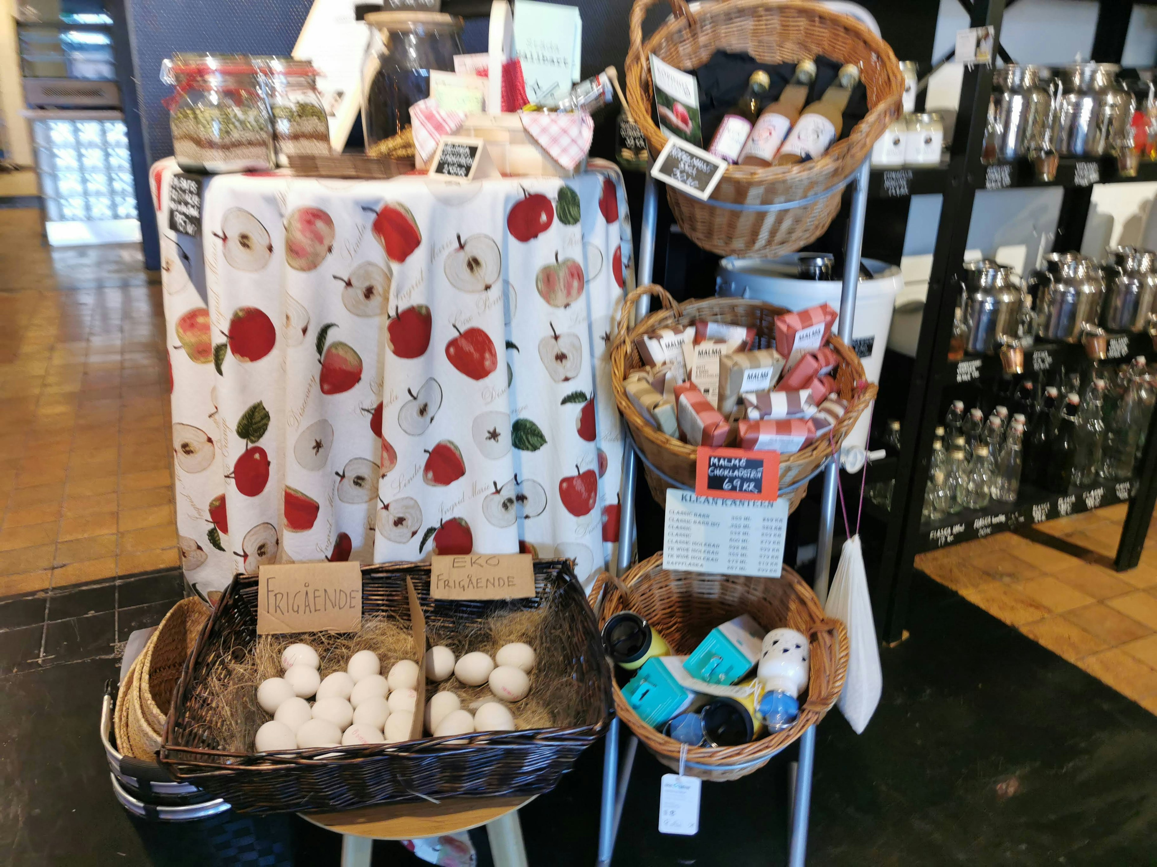 Colorful product baskets displayed in a store interior