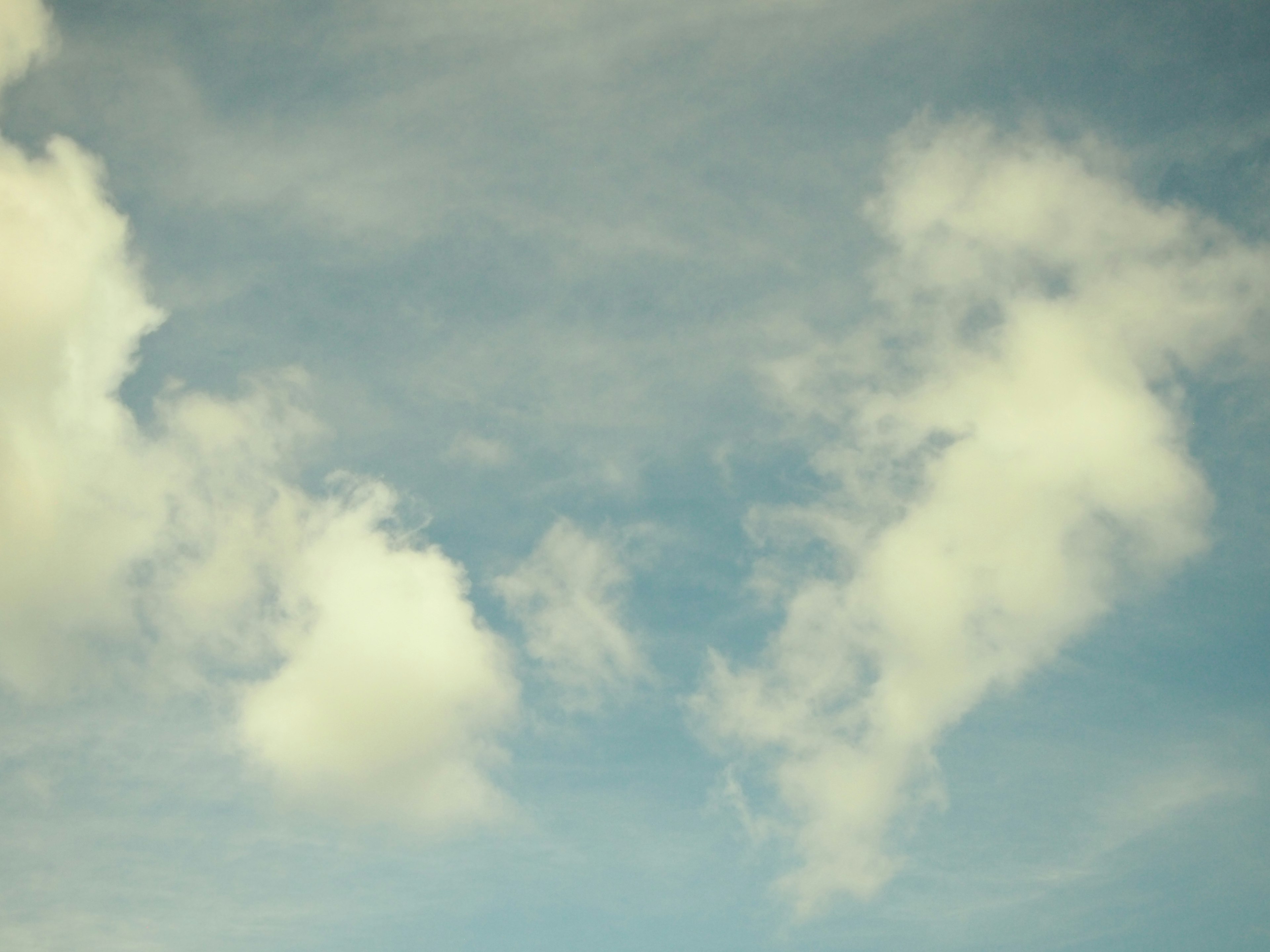 Pattern of white clouds in a blue sky