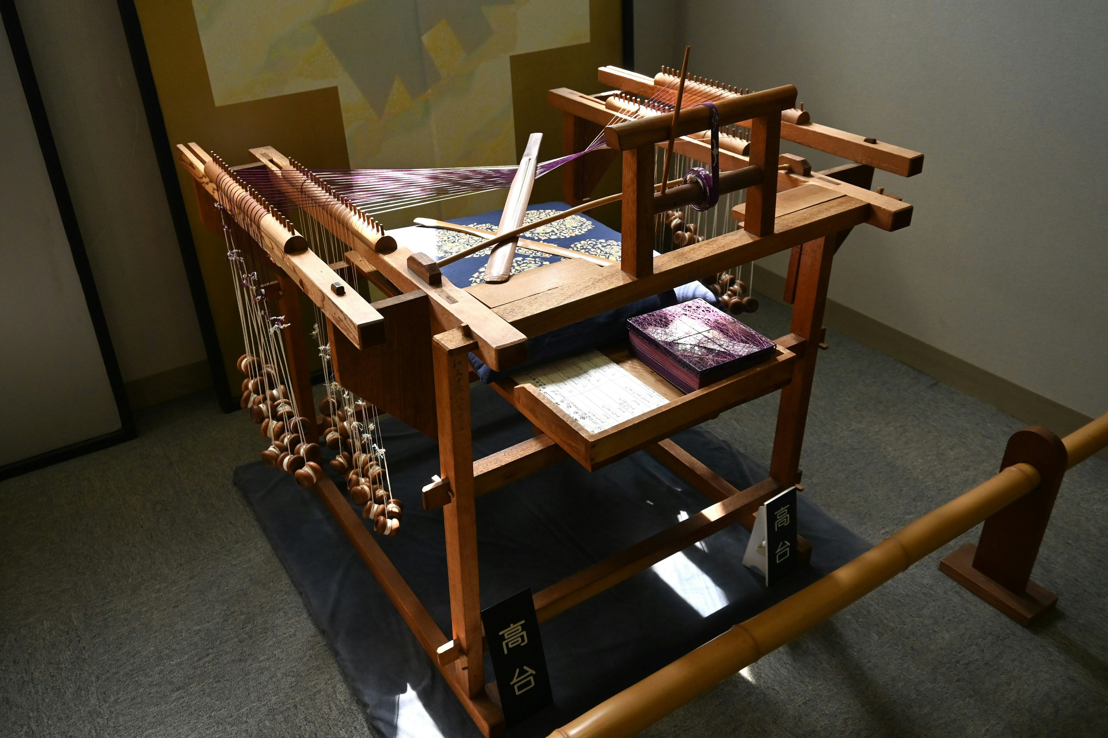 Traditional wooden loom placed indoors