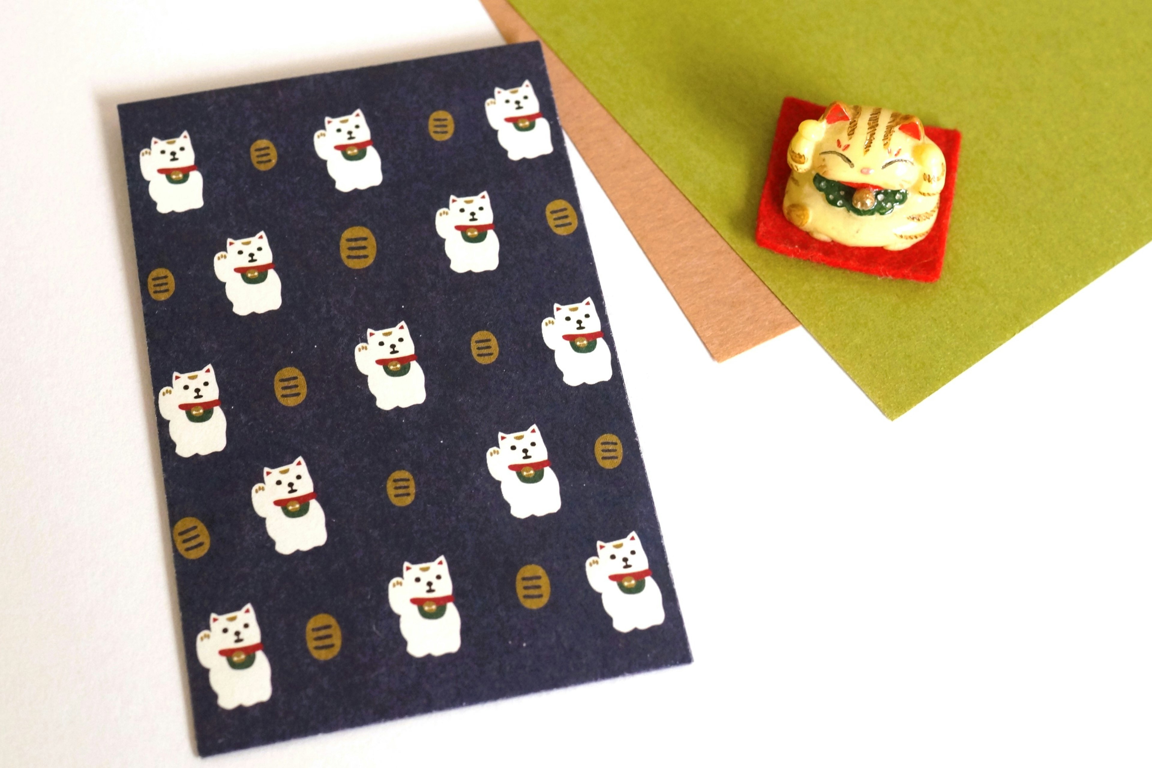 Card featuring cat characters on a blue background with colorful felt pieces