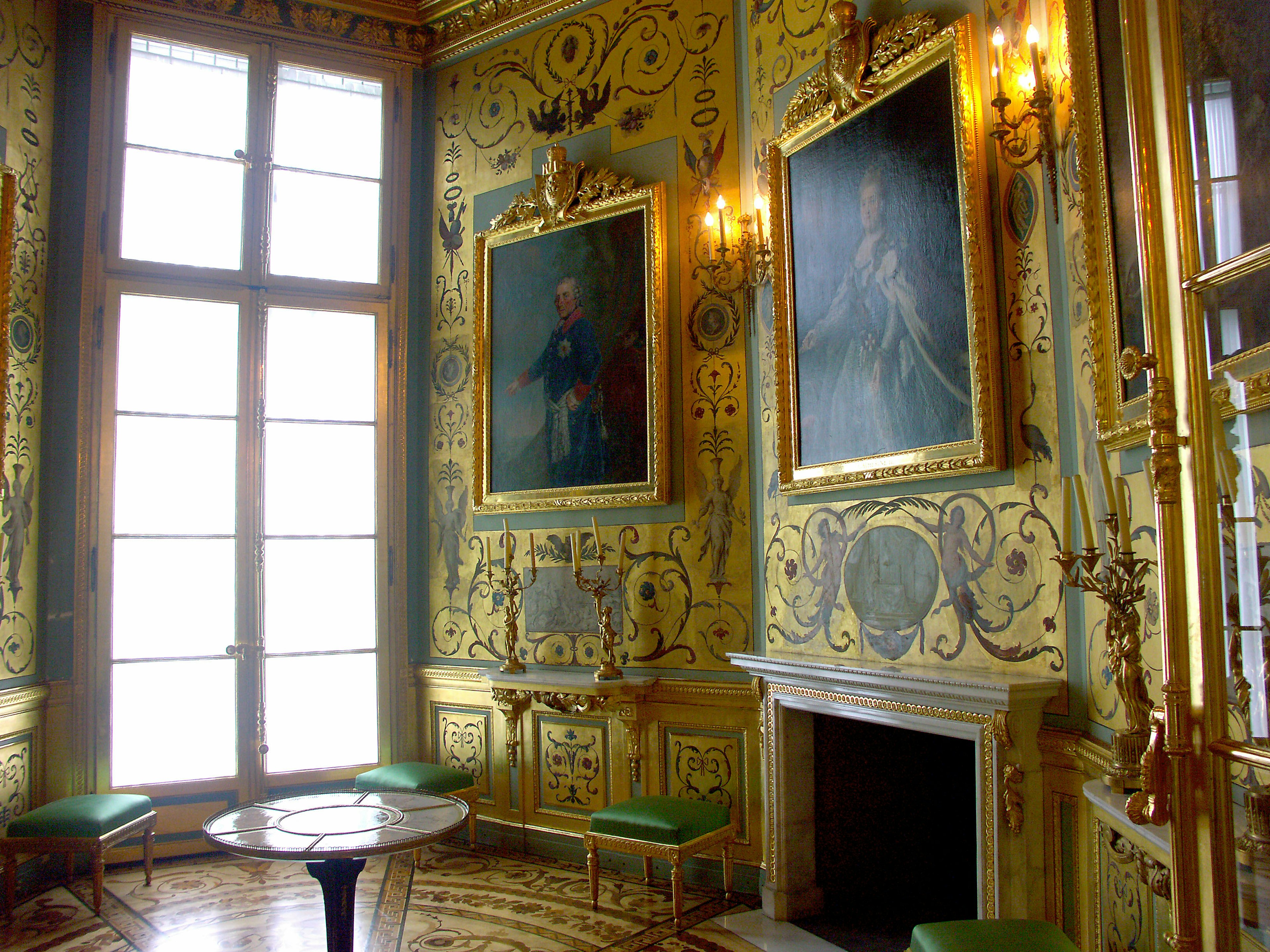 Interior of a room with luxurious wall decorations and paintings