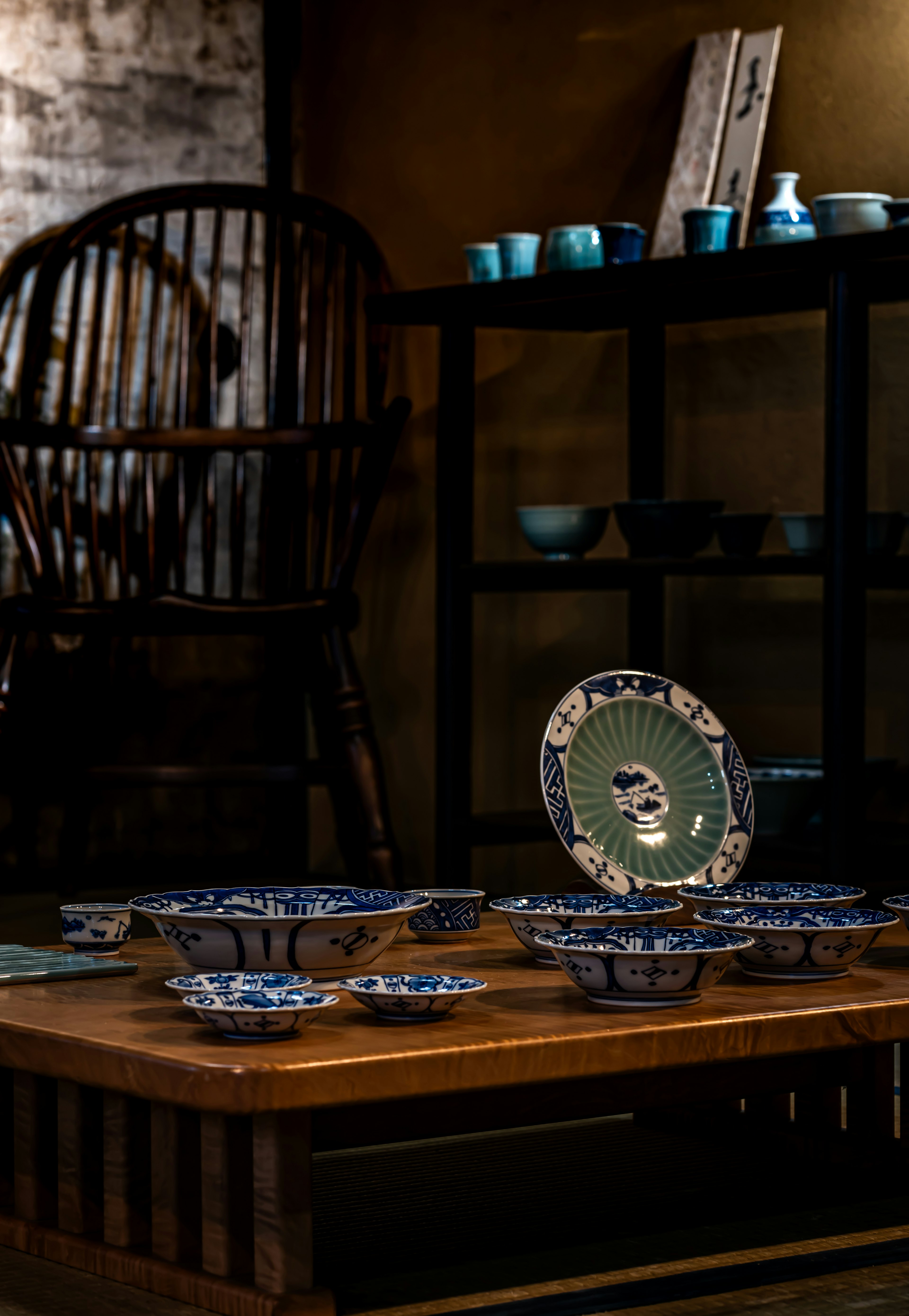 Scene with blue dishware arranged on a wooden table