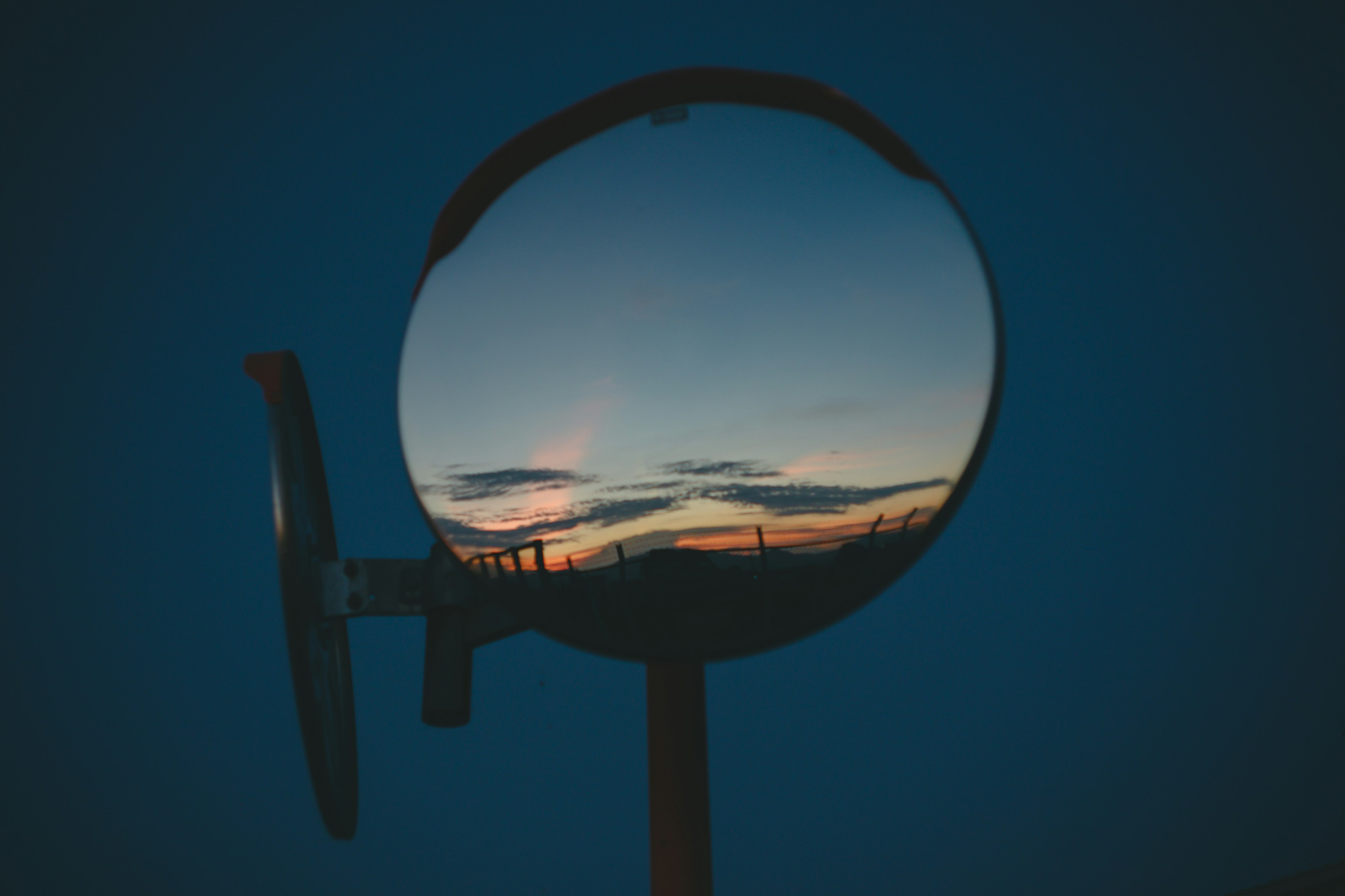 Reflection of sunset in a circular mirror