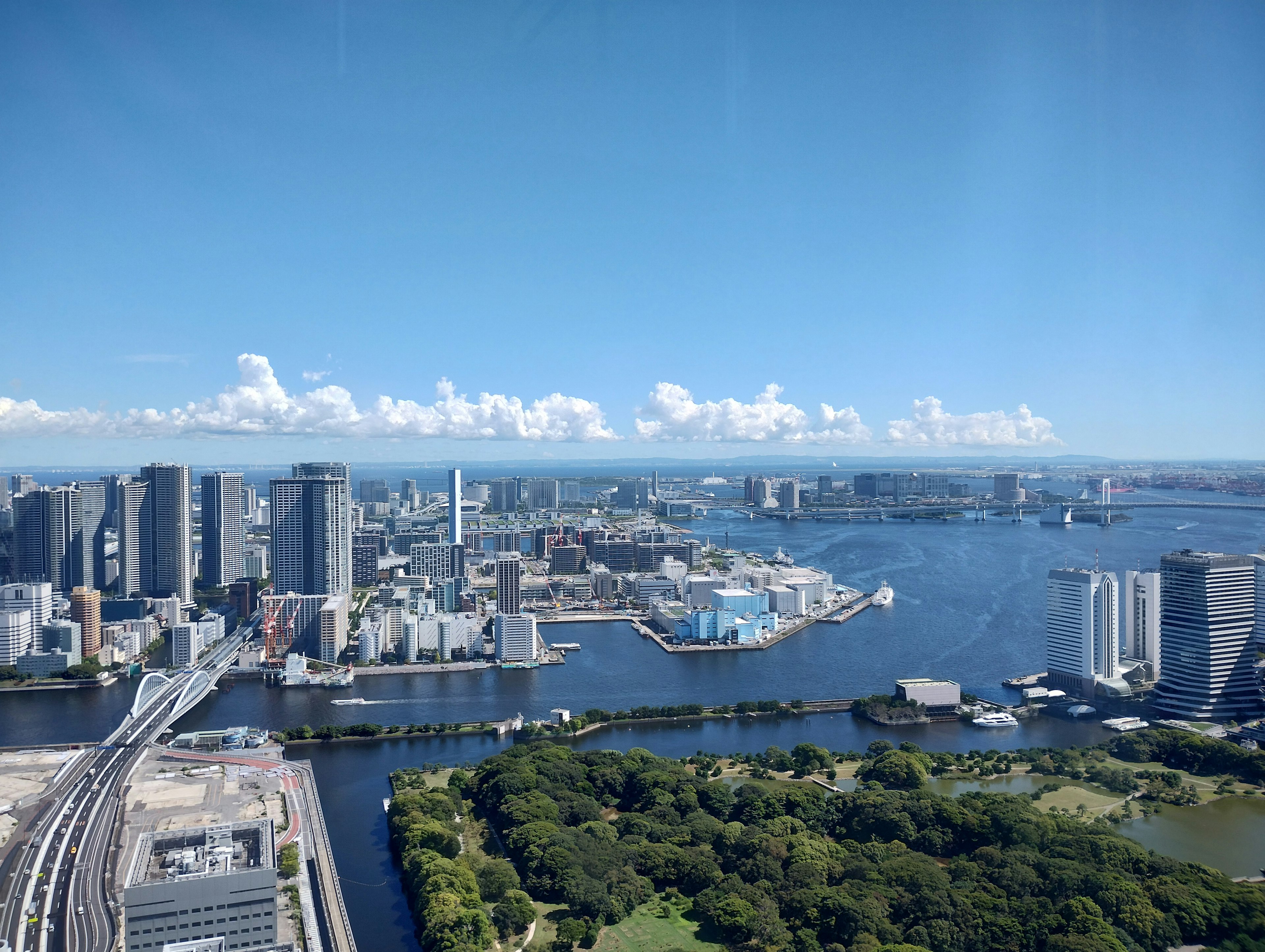 Aerial view of Tokyo's skyscrapers and river landscape