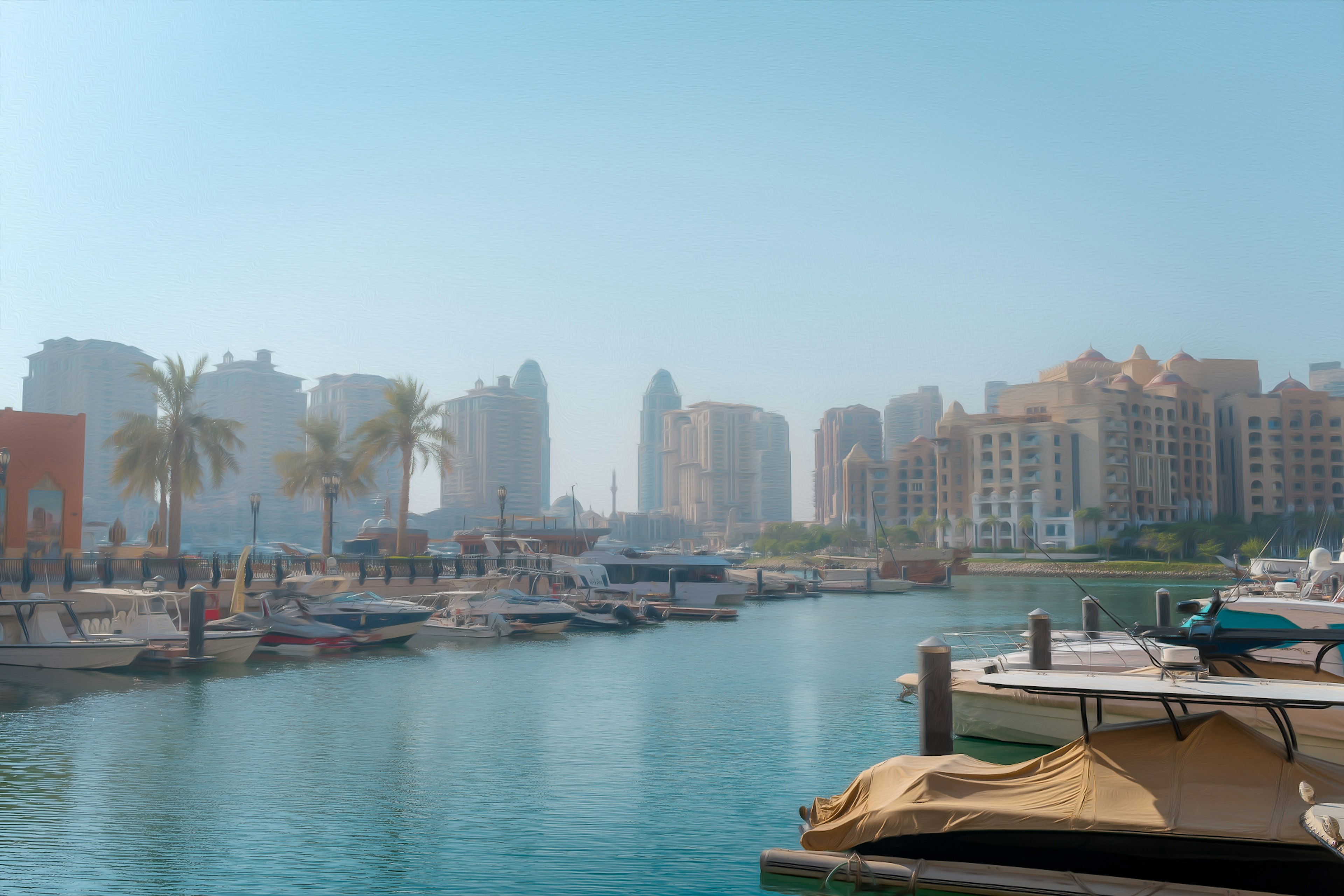 Blick auf eine Marina mit Booten und modernen Wolkenkratzern in Dubai