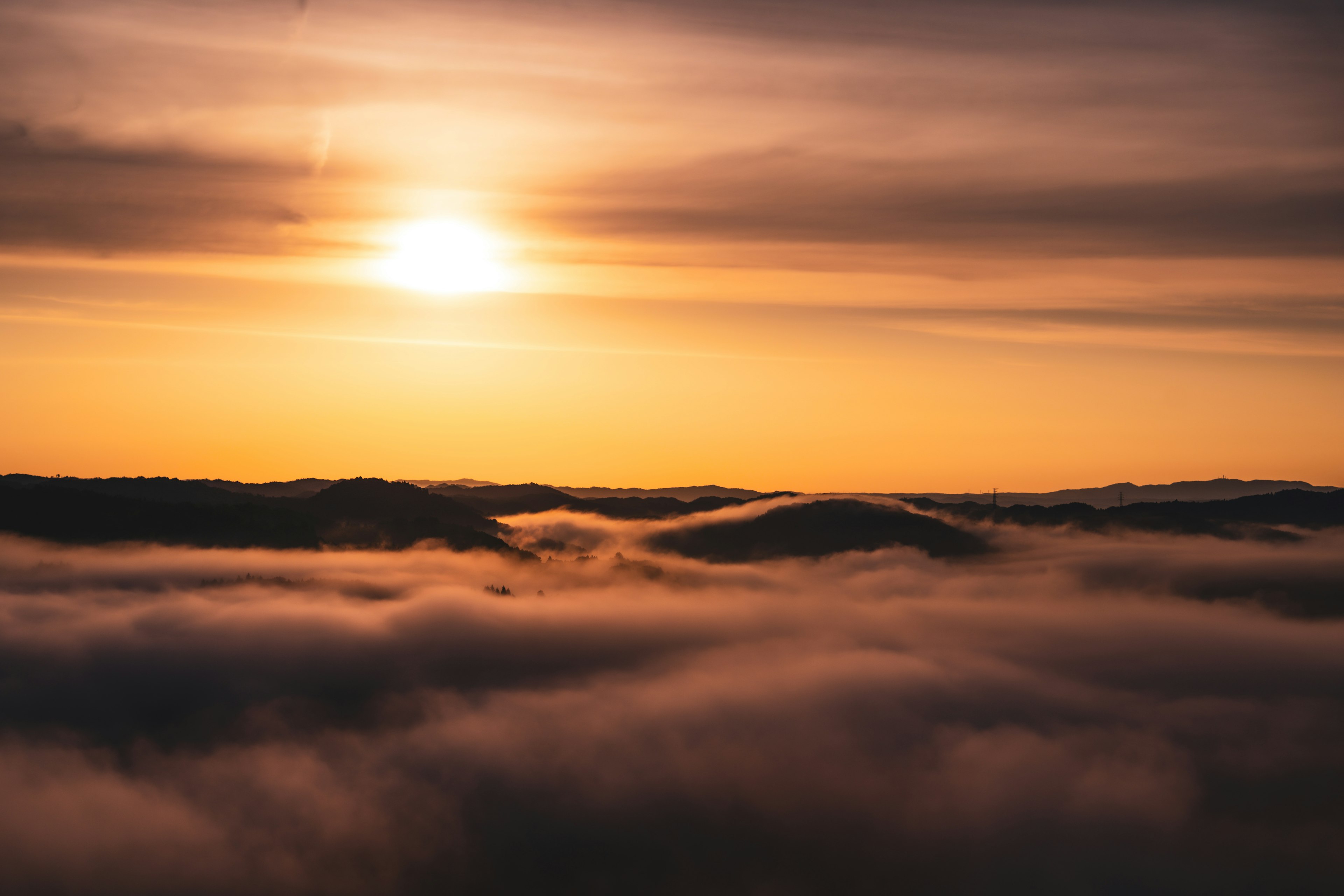 A beautiful landscape with the sun shining above the clouds