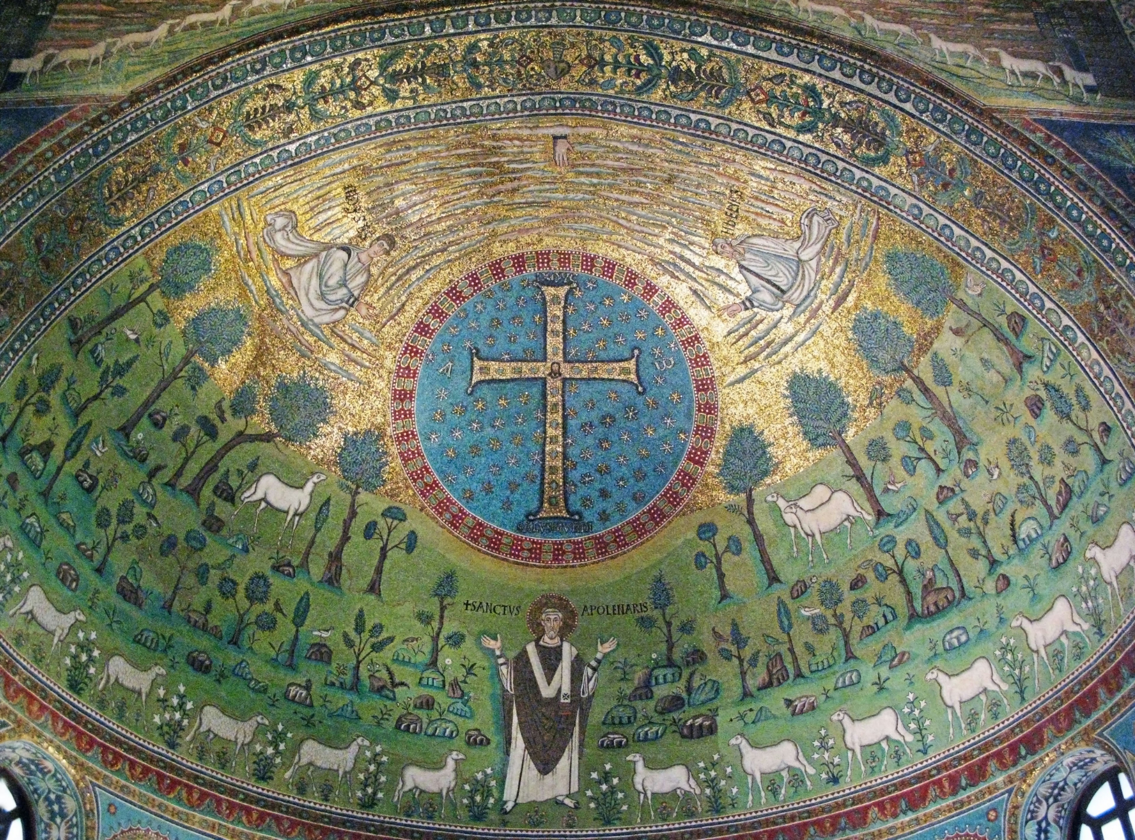 Mosaic depicting a central cross surrounded by angels and sheep in a lush green landscape with a golden background