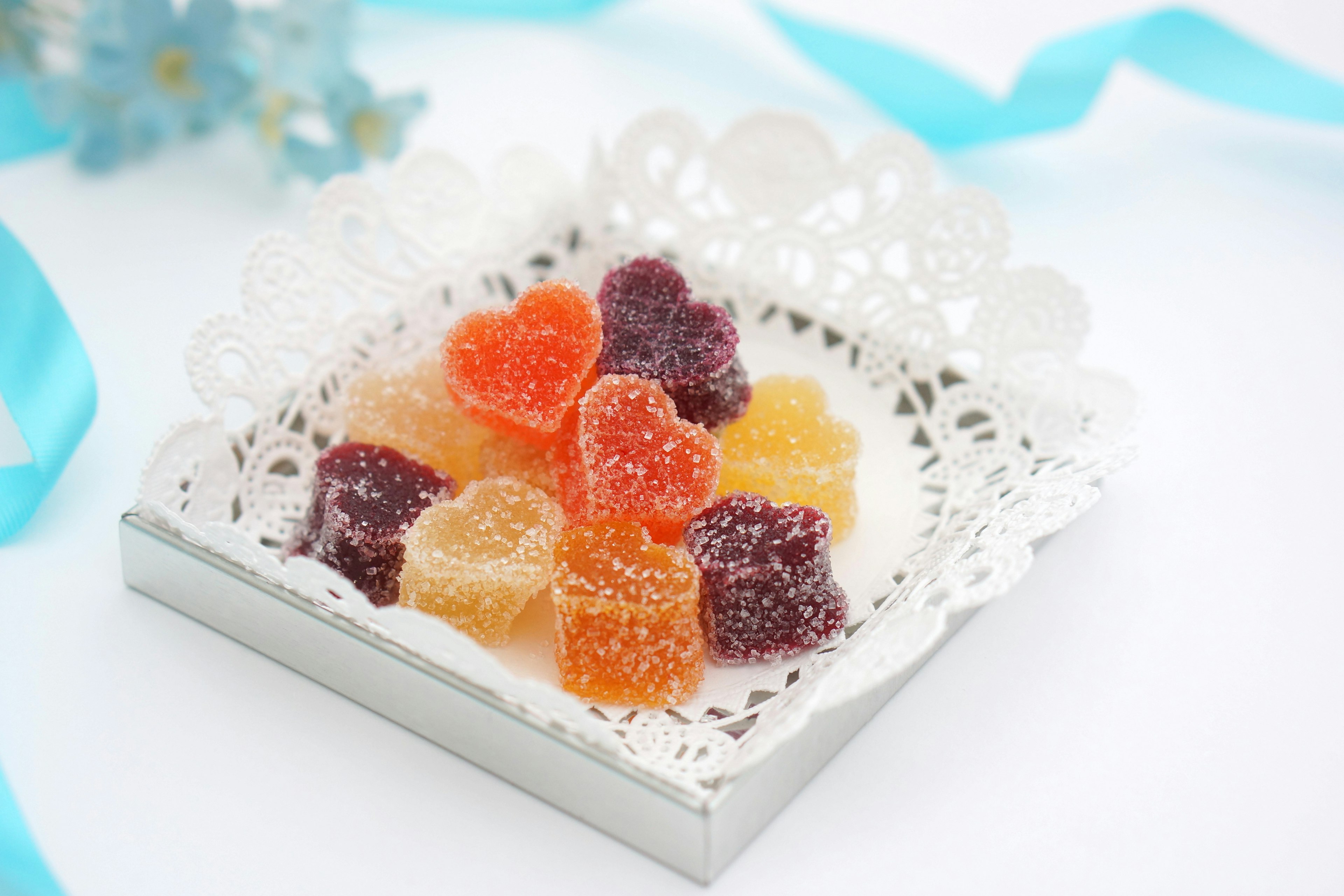 Colorful jelly candies arranged on a white tray