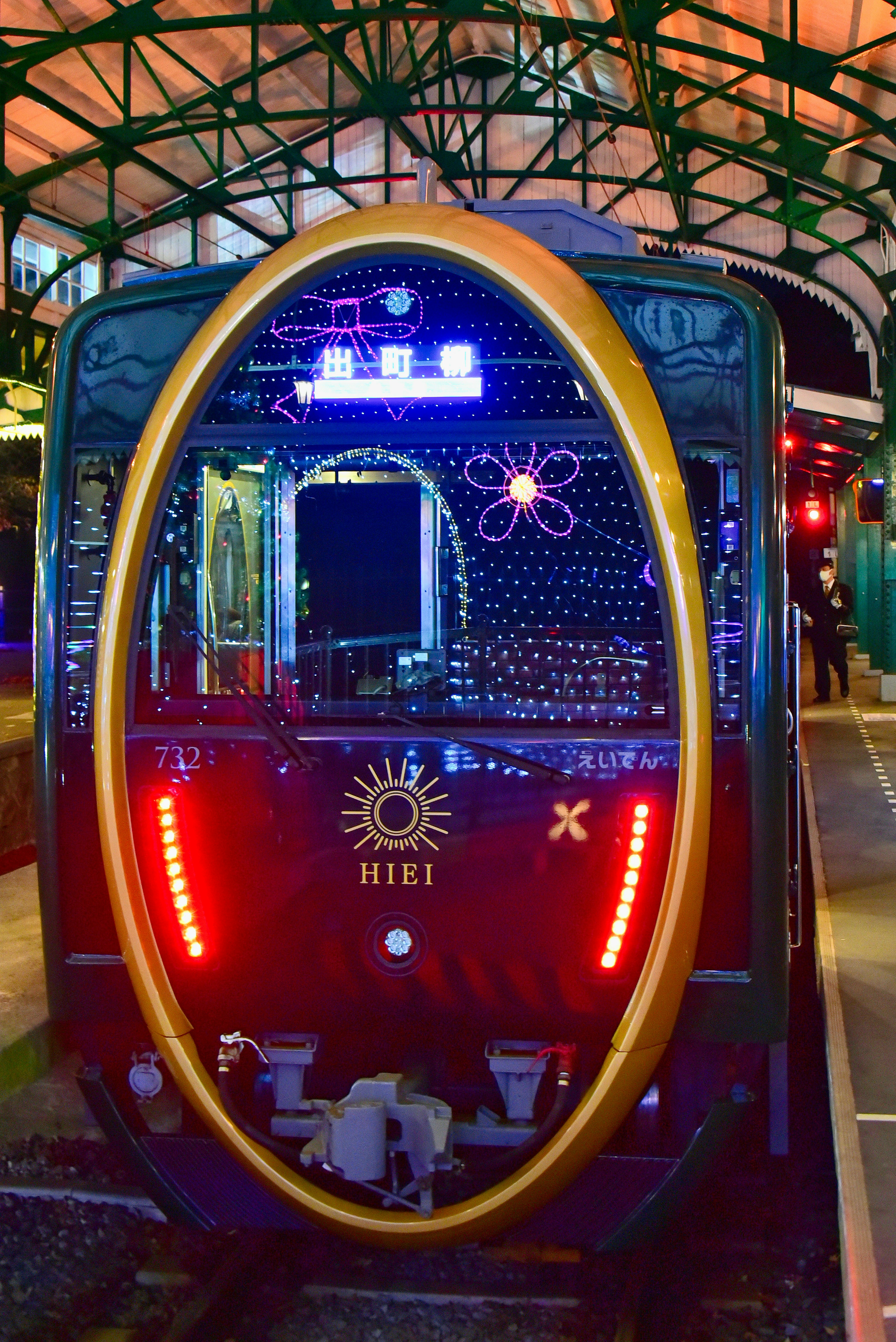 A beautifully decorated train rear at a station