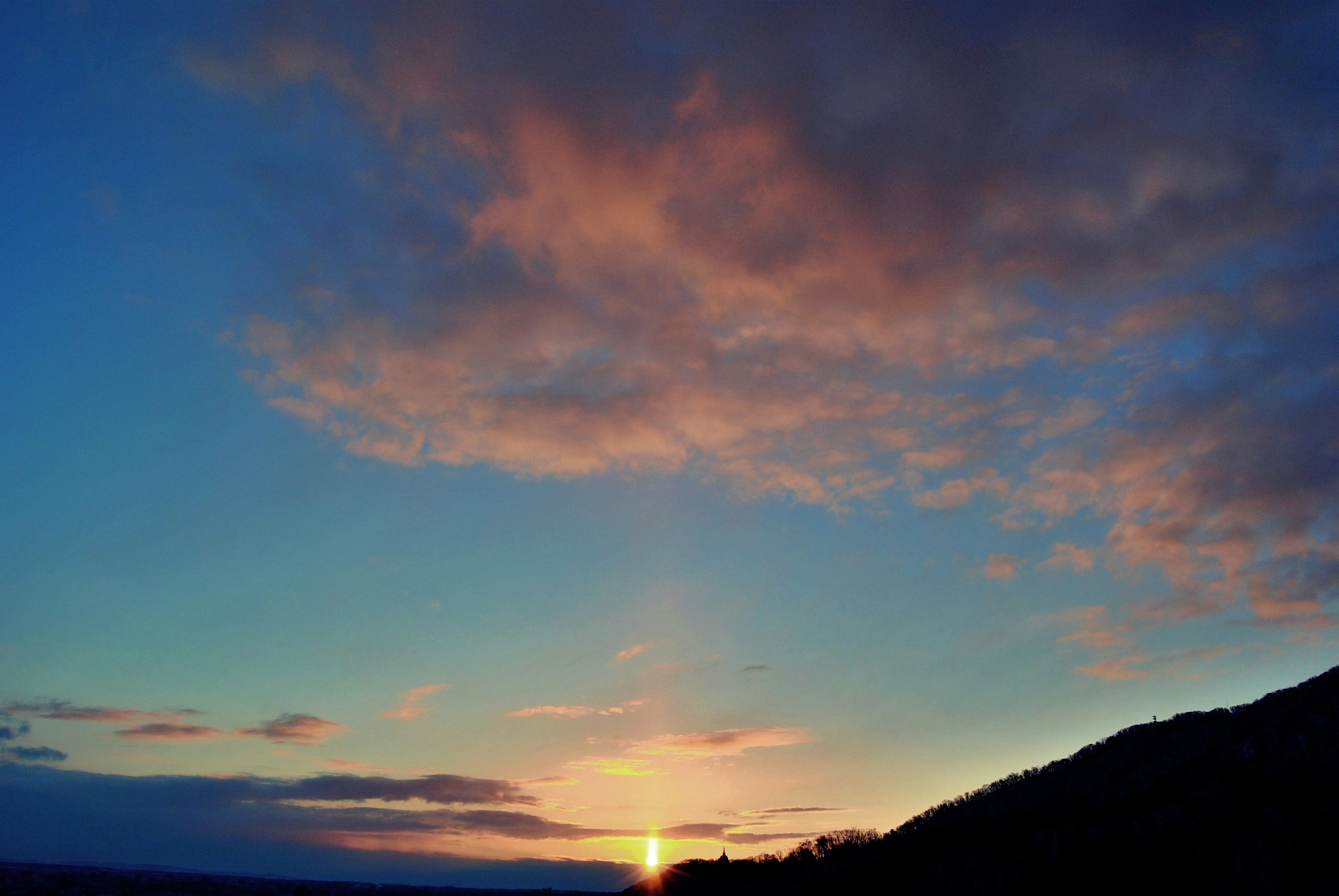 Beautiful sunset sky with clouds