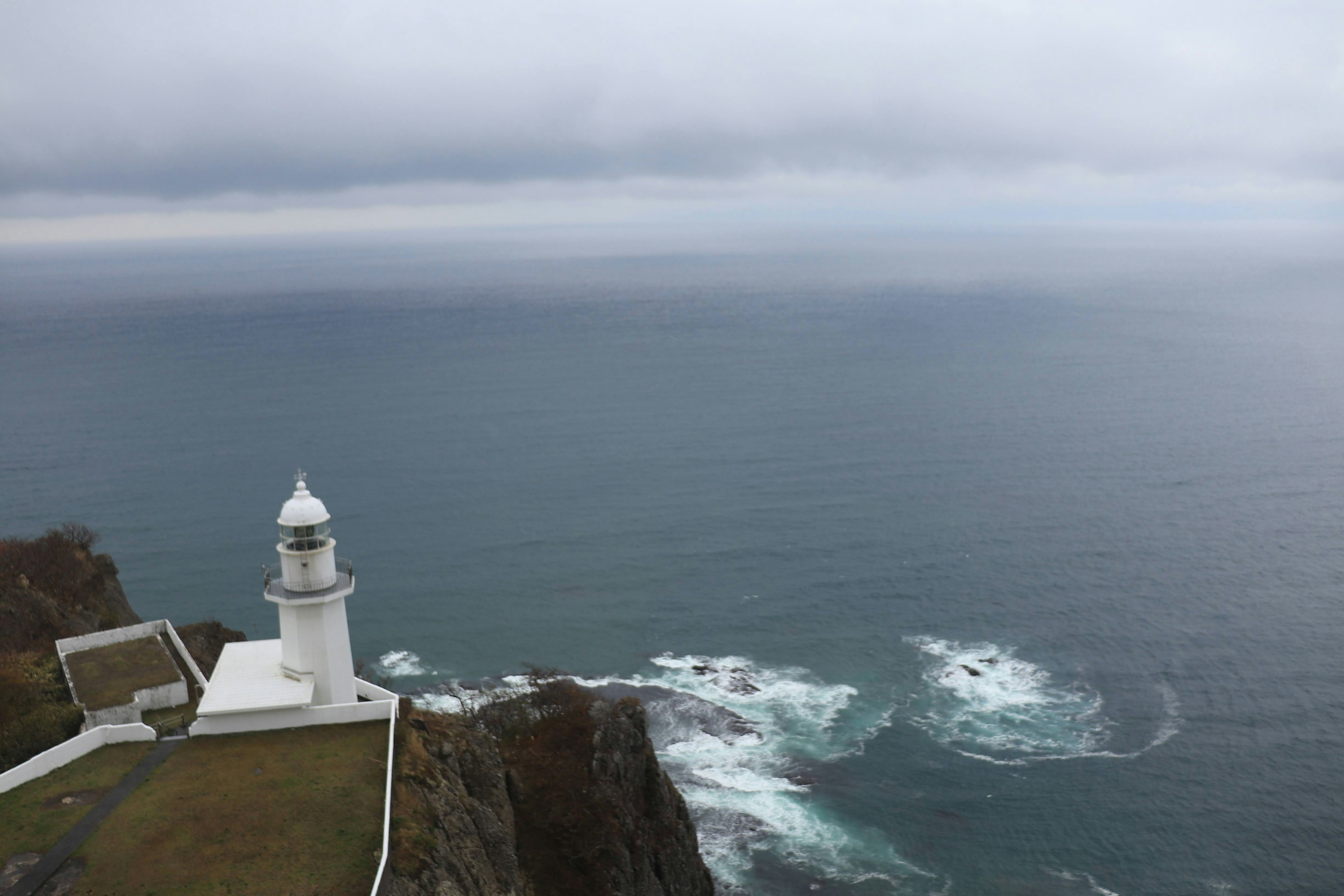 Scenic view of a lighthouse overlooking the ocean