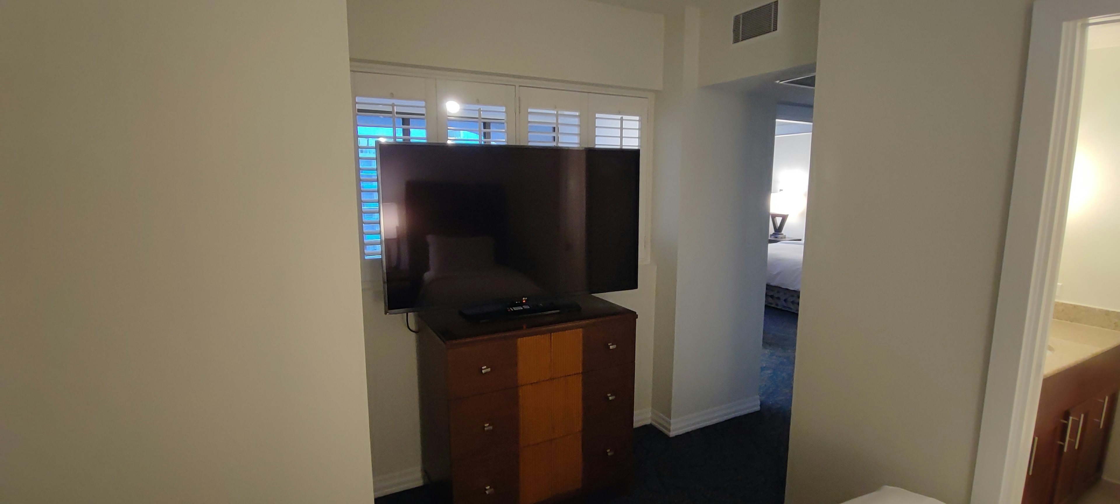 Simple interior with a television and cabinet in a room