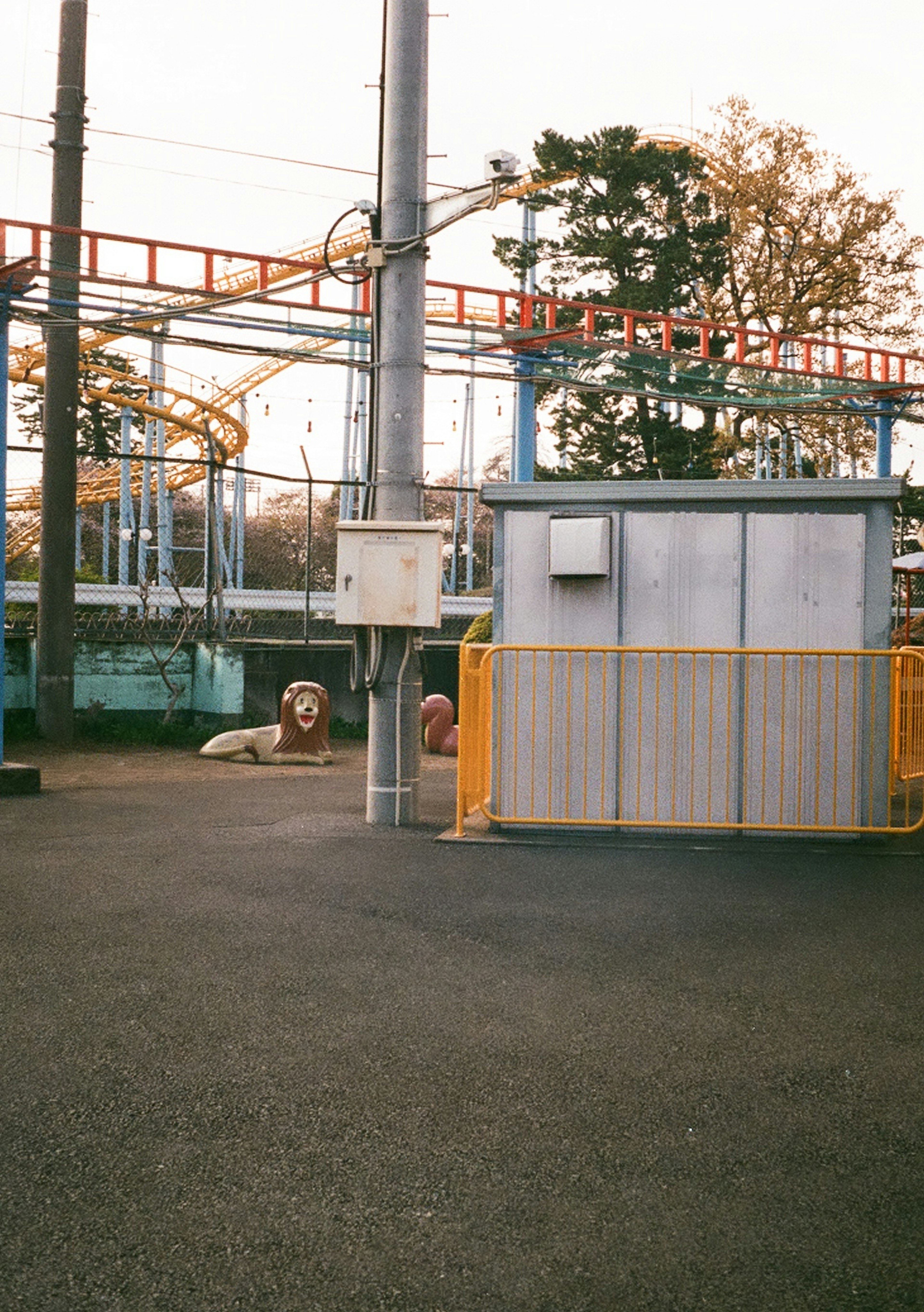 View of an amusement park section with a small shed