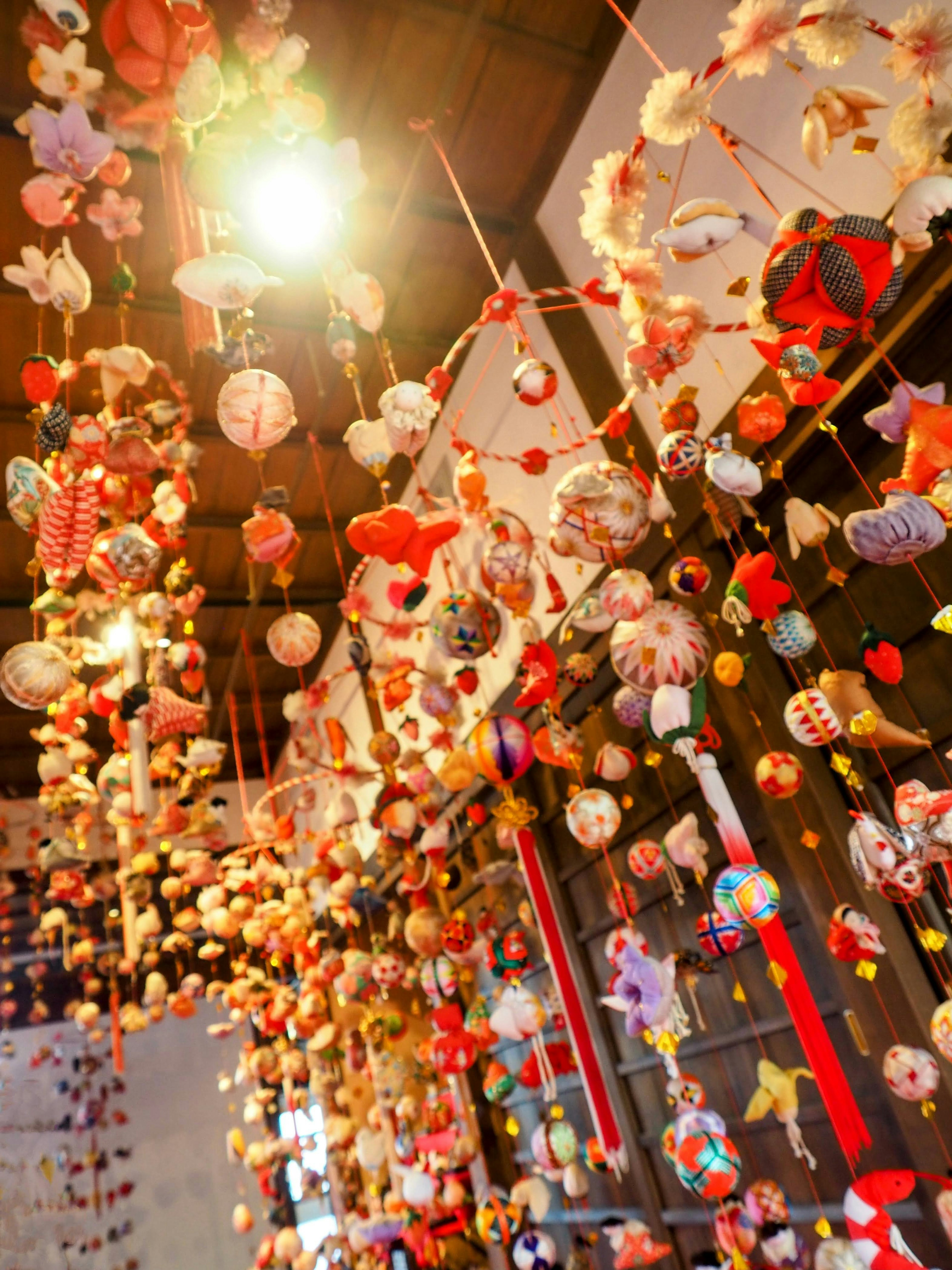 Interior view filled with colorful hanging decorations and ornaments