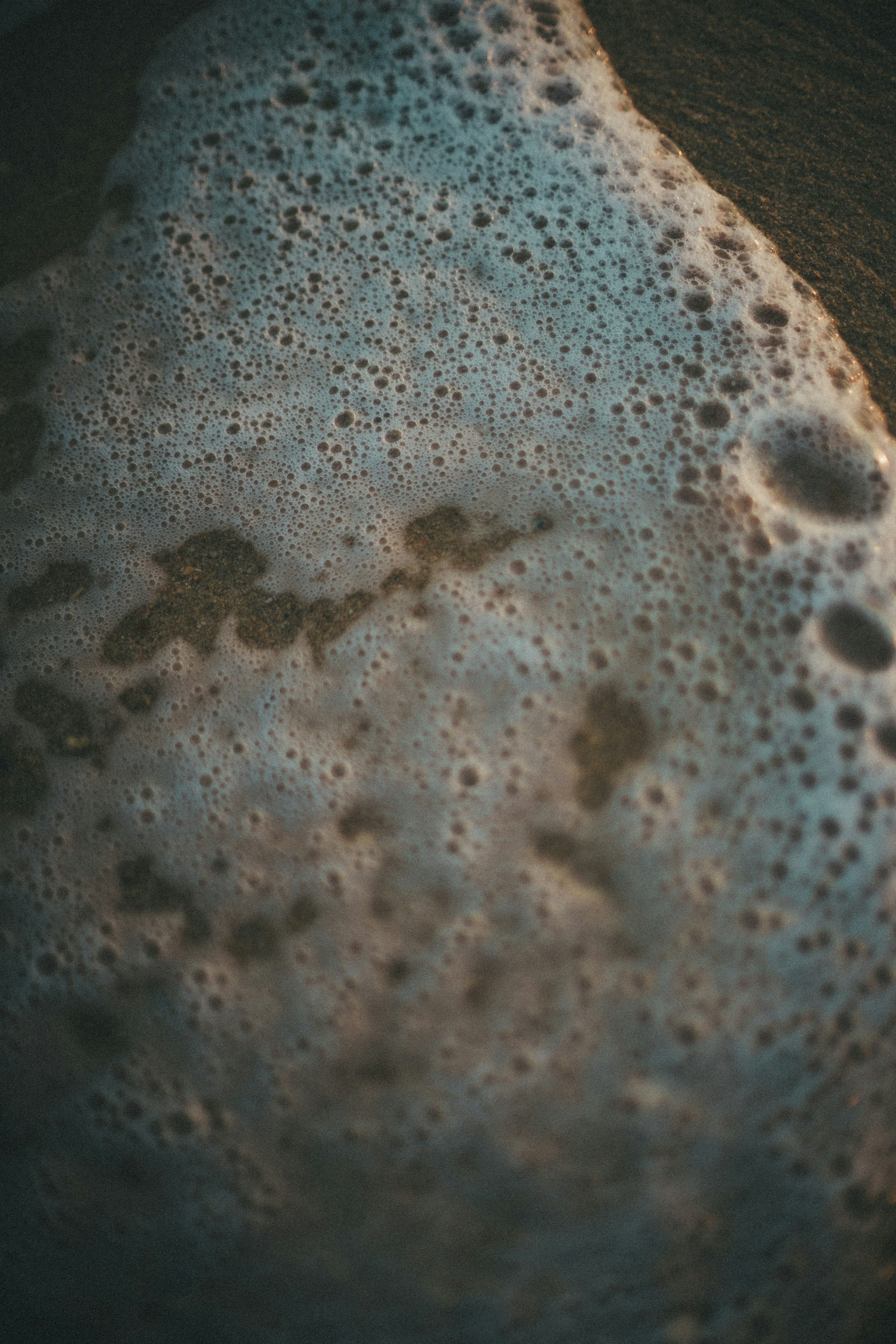 Image showing the contact of blue ocean foam with sand