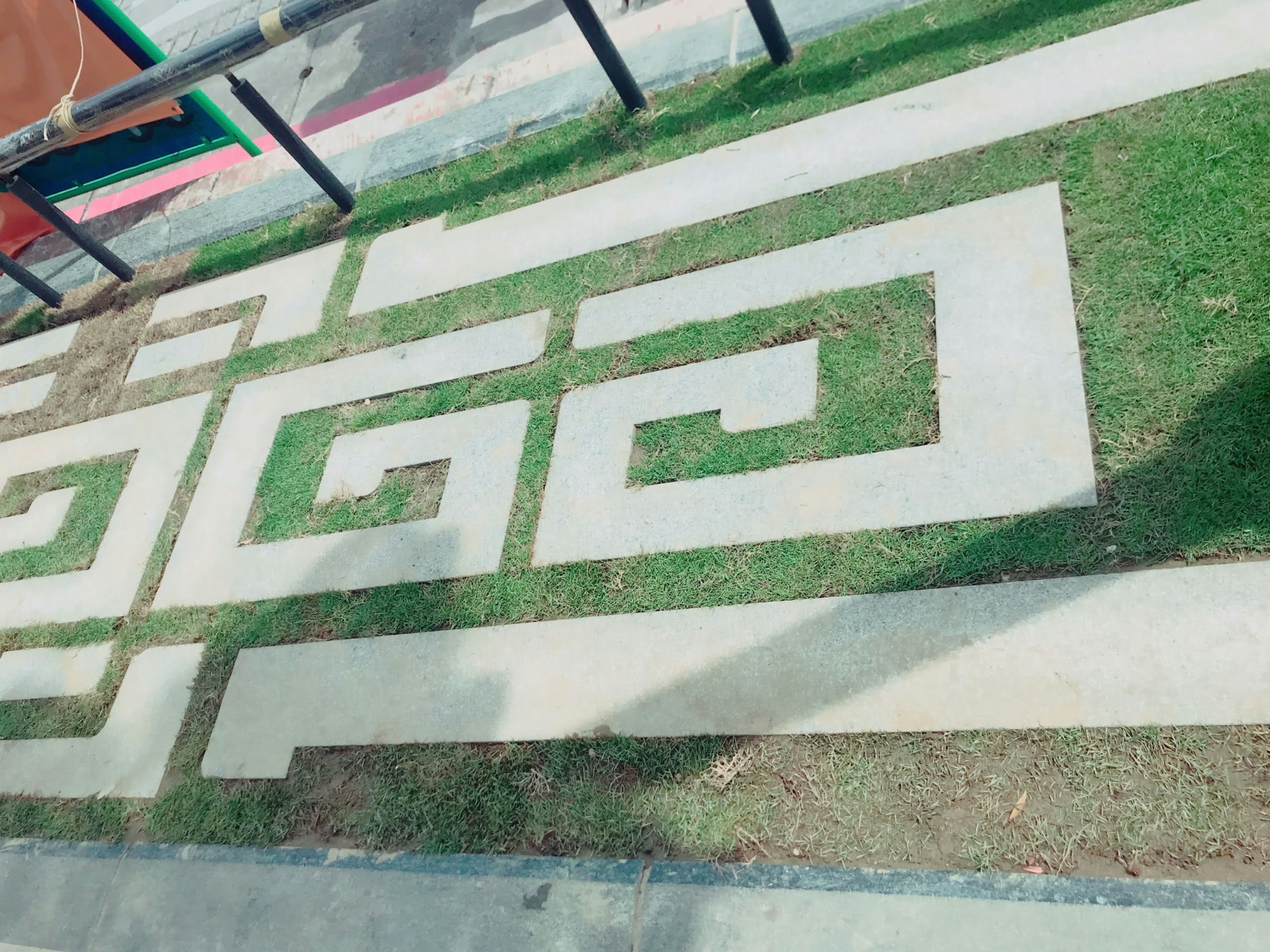 Park landscape with grass and concrete pattern