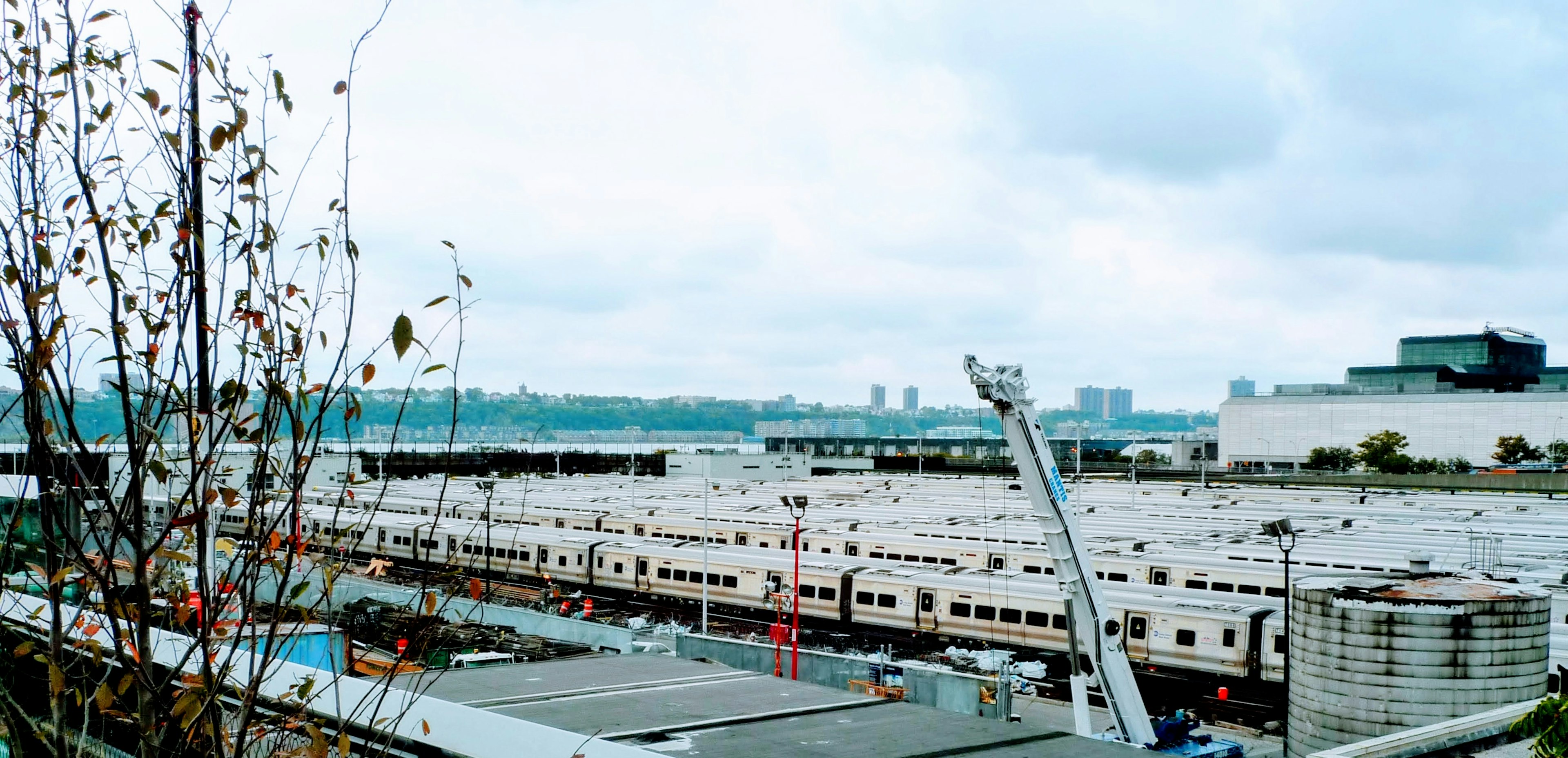 Vast view of a factory area with construction crane