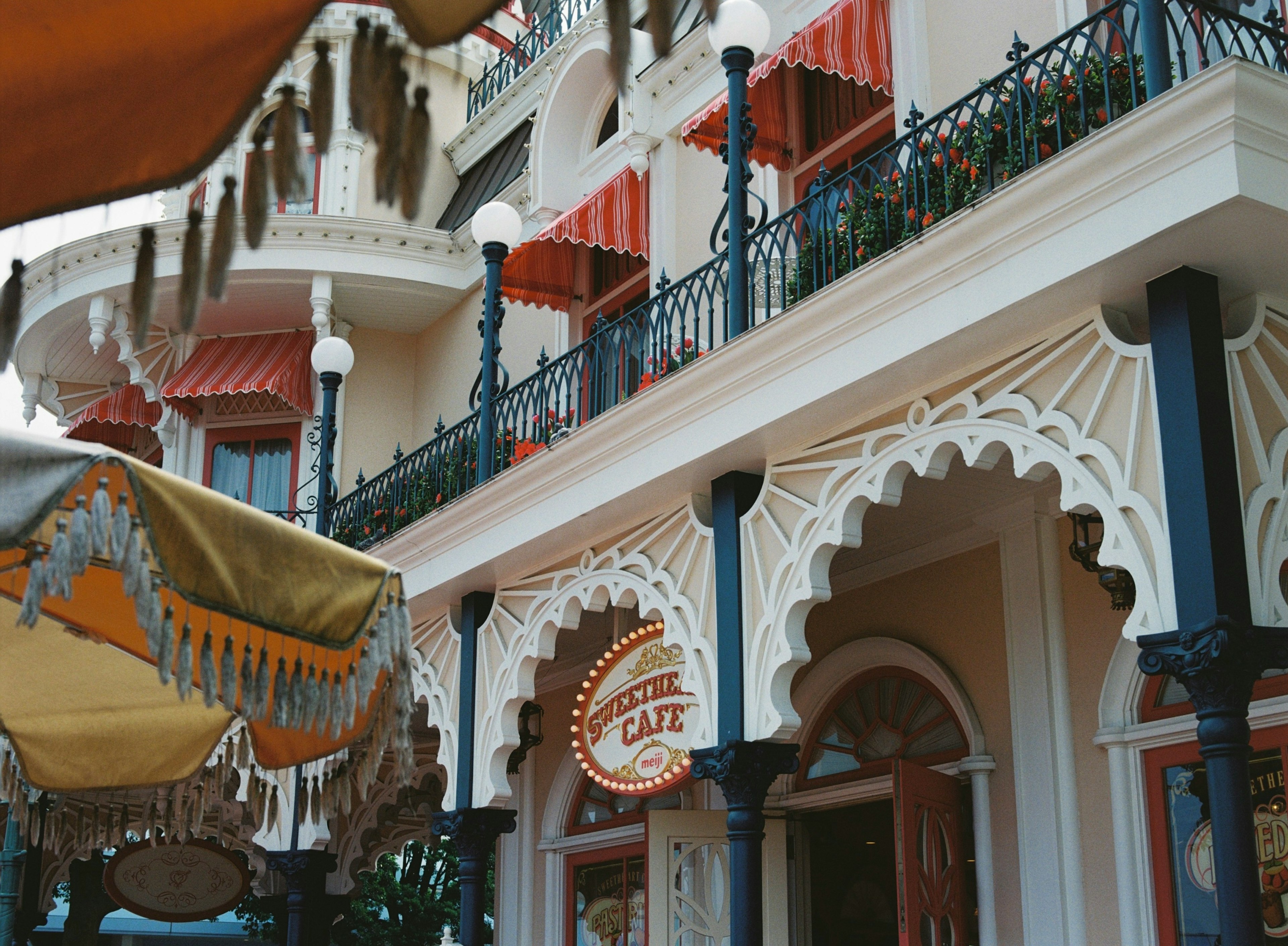 Exterior view of a cafe with ornate architectural details