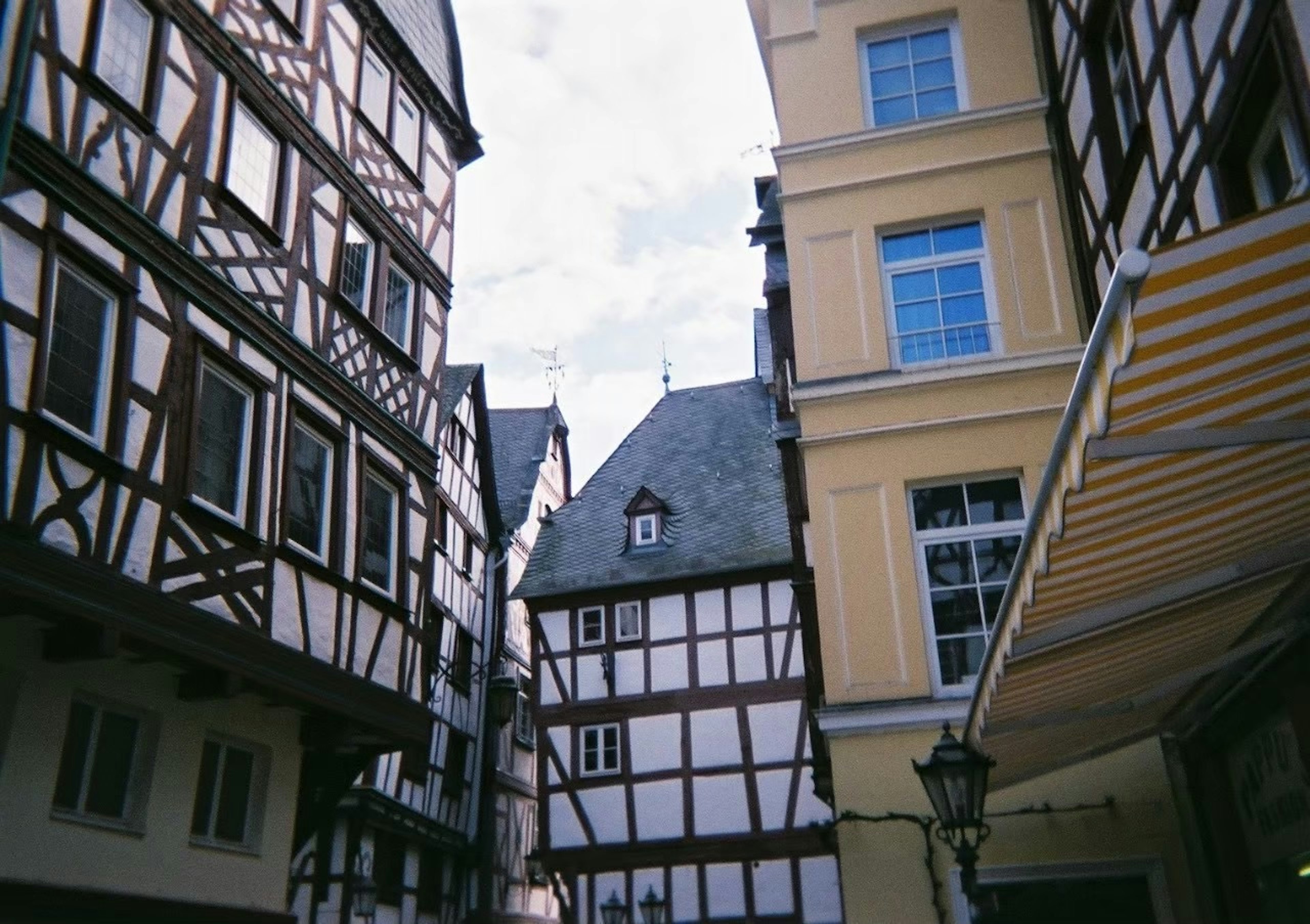 View of medieval half-timbered houses along a narrow street