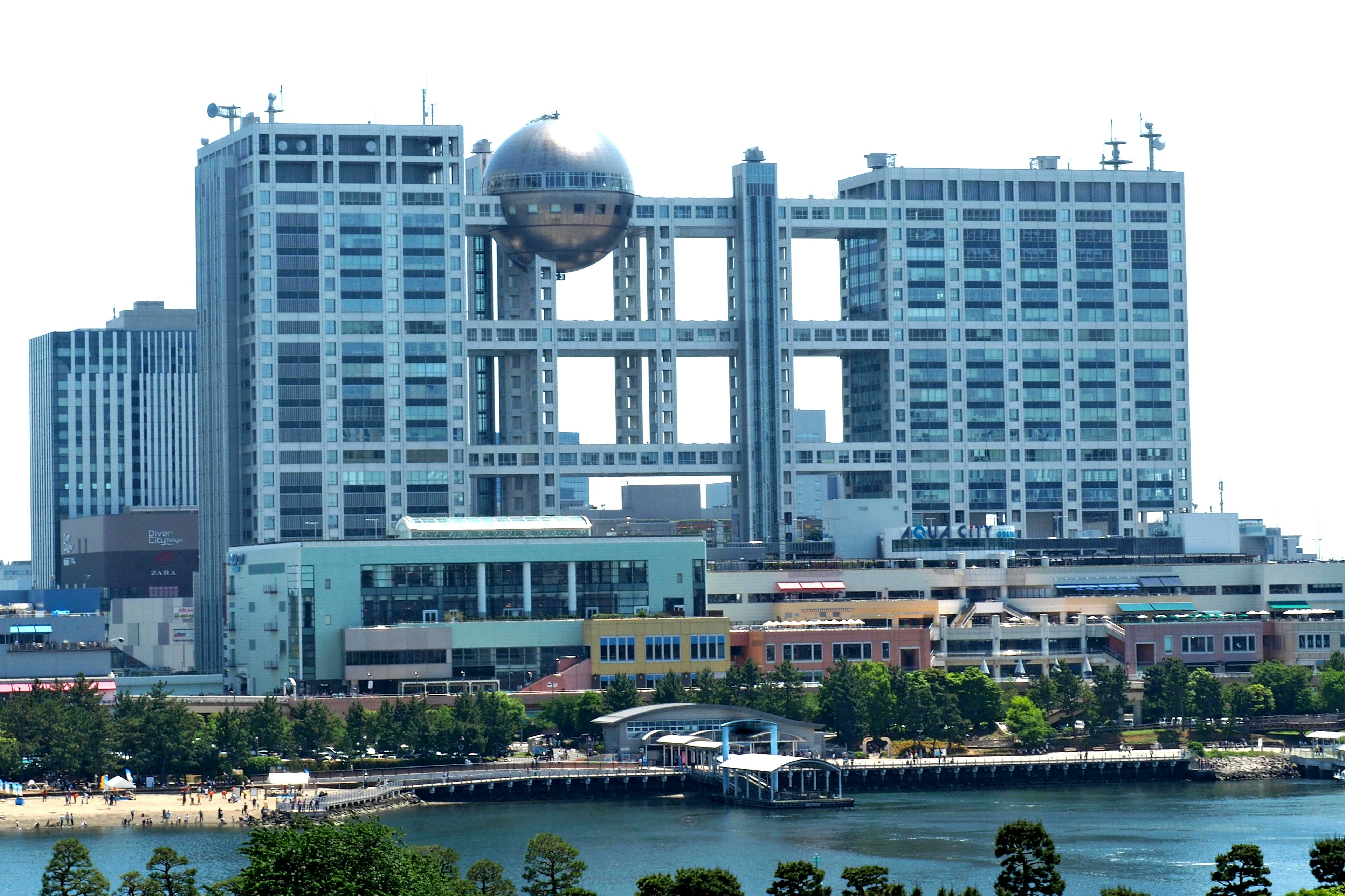 Unique design of Fuji Television headquarters building with waterfront view