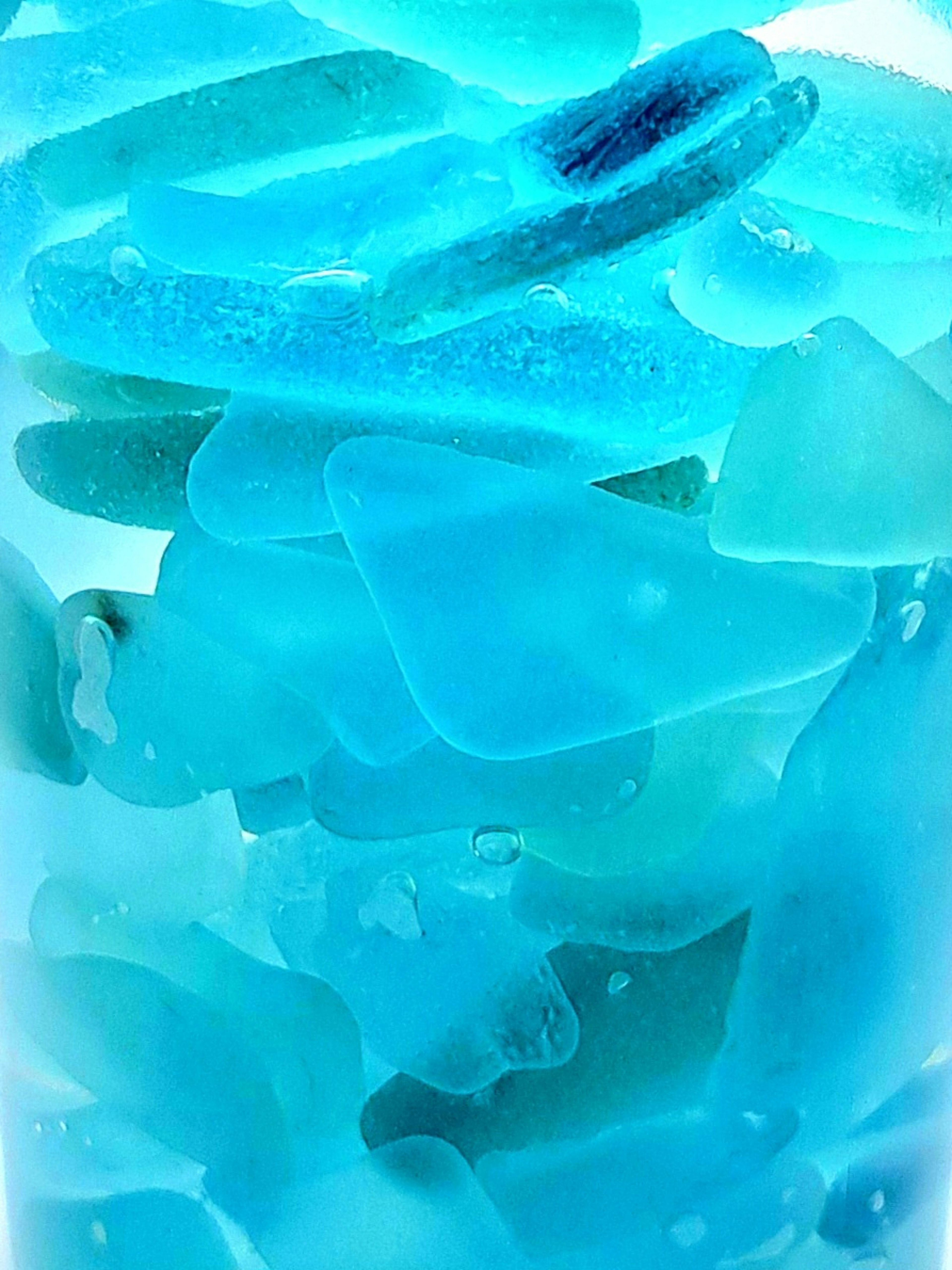 Beautiful image of overlapping blue glass pieces