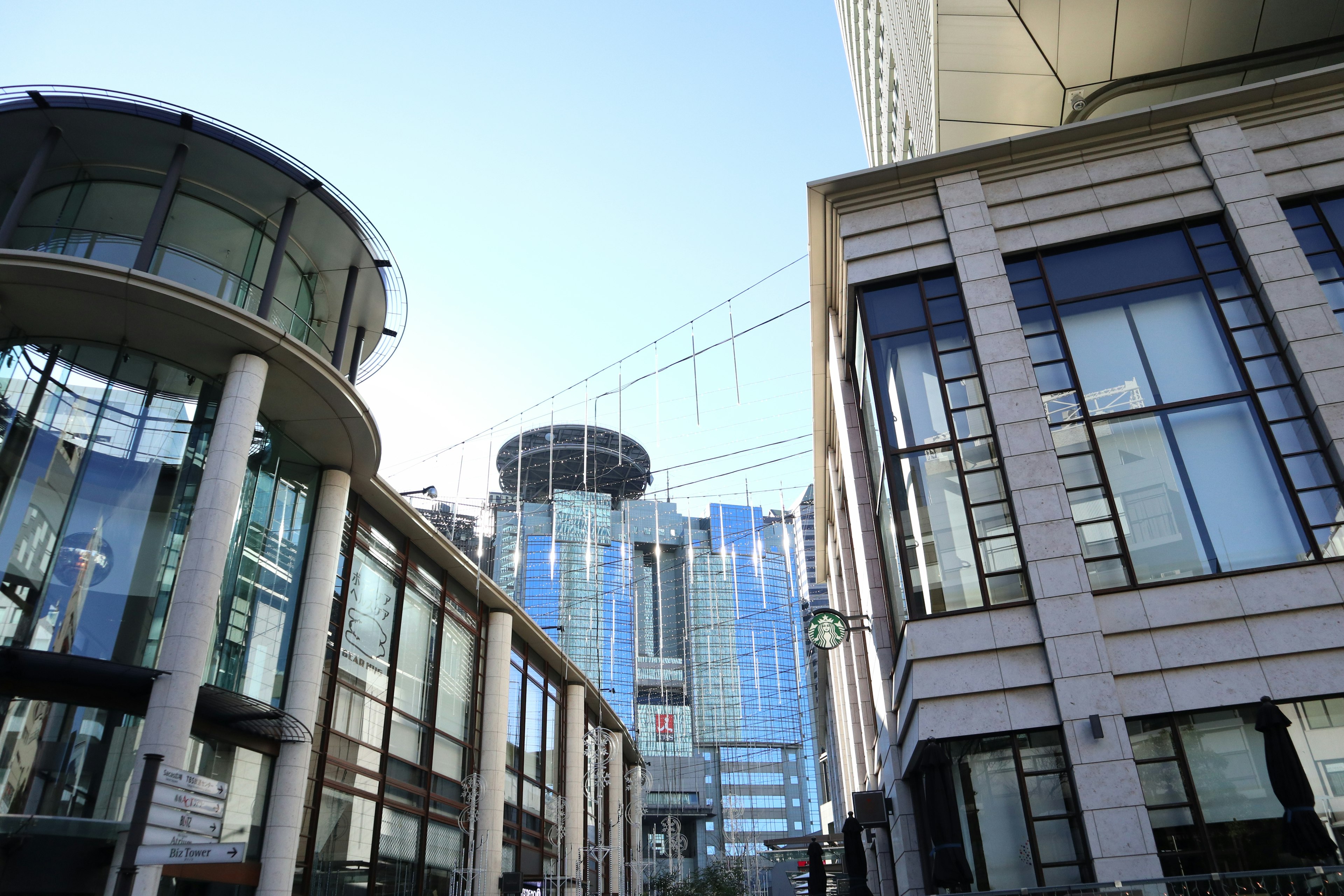 Urban landscape with modern buildings featuring glass and metal facades