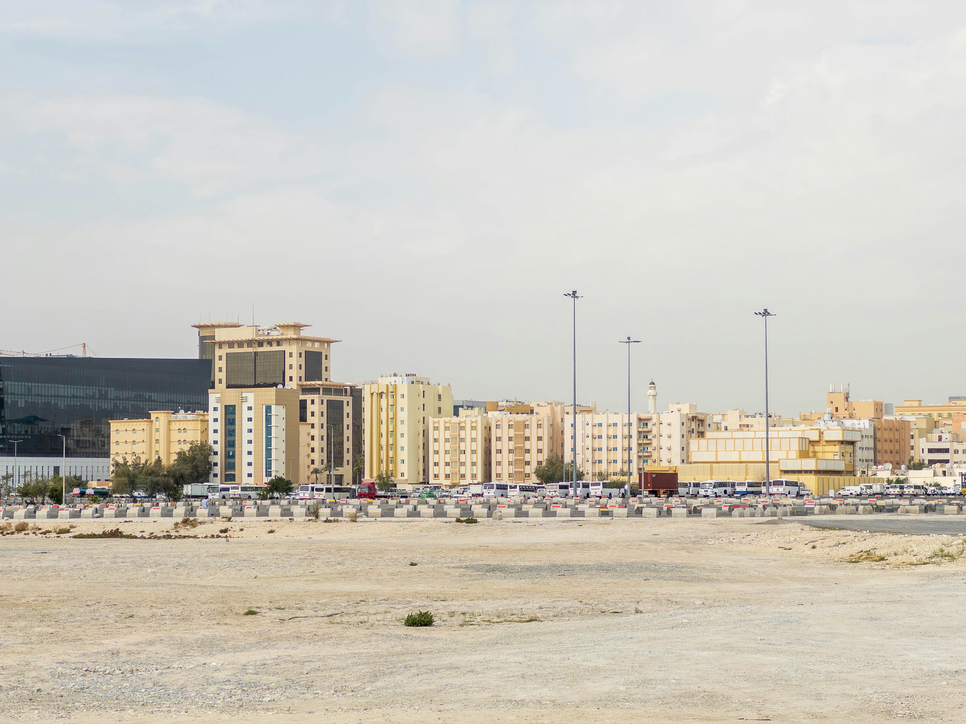 Urban skyline featuring a row of modern buildings