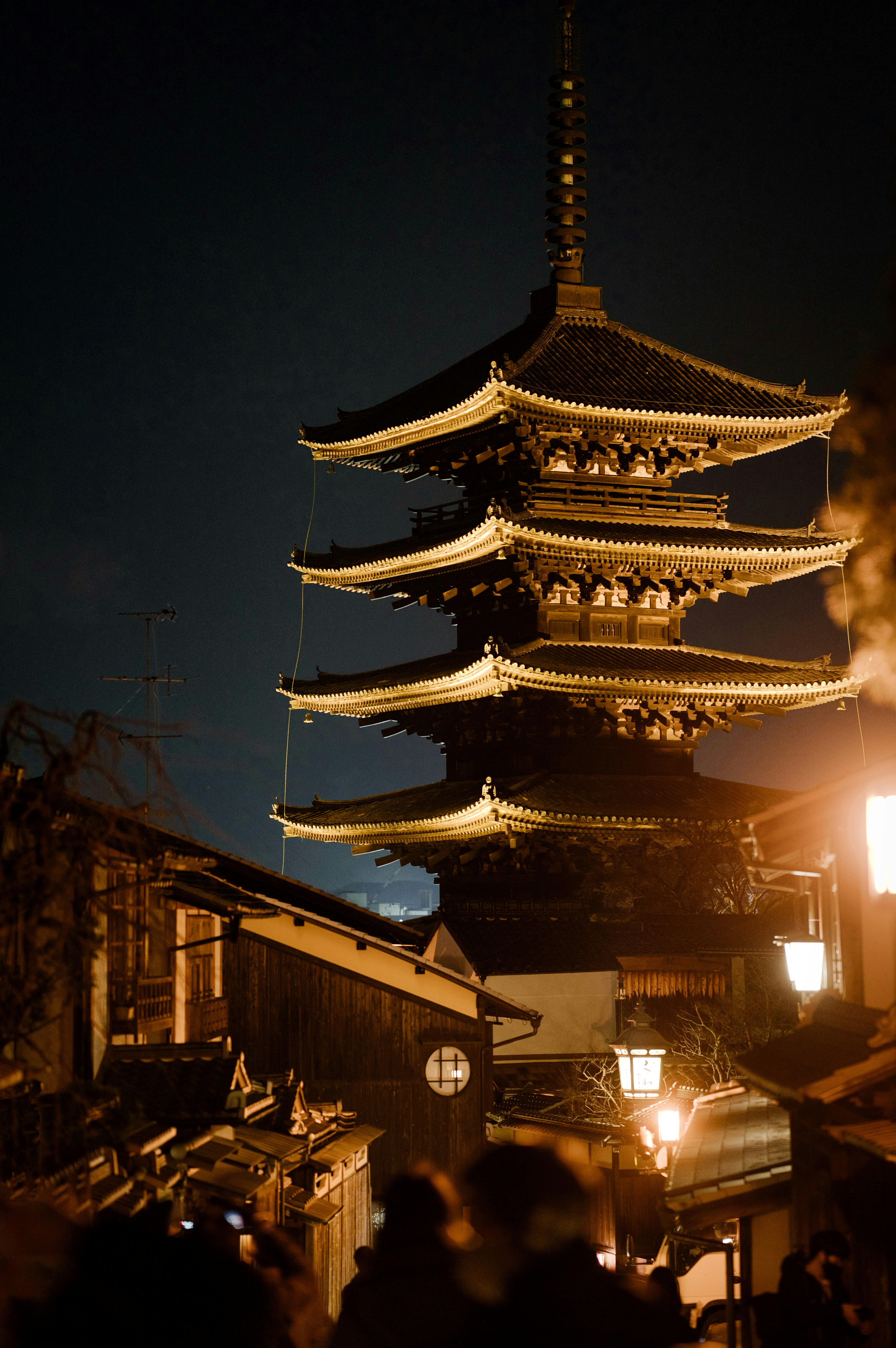 Night view of a five-story pagoda with streetlights