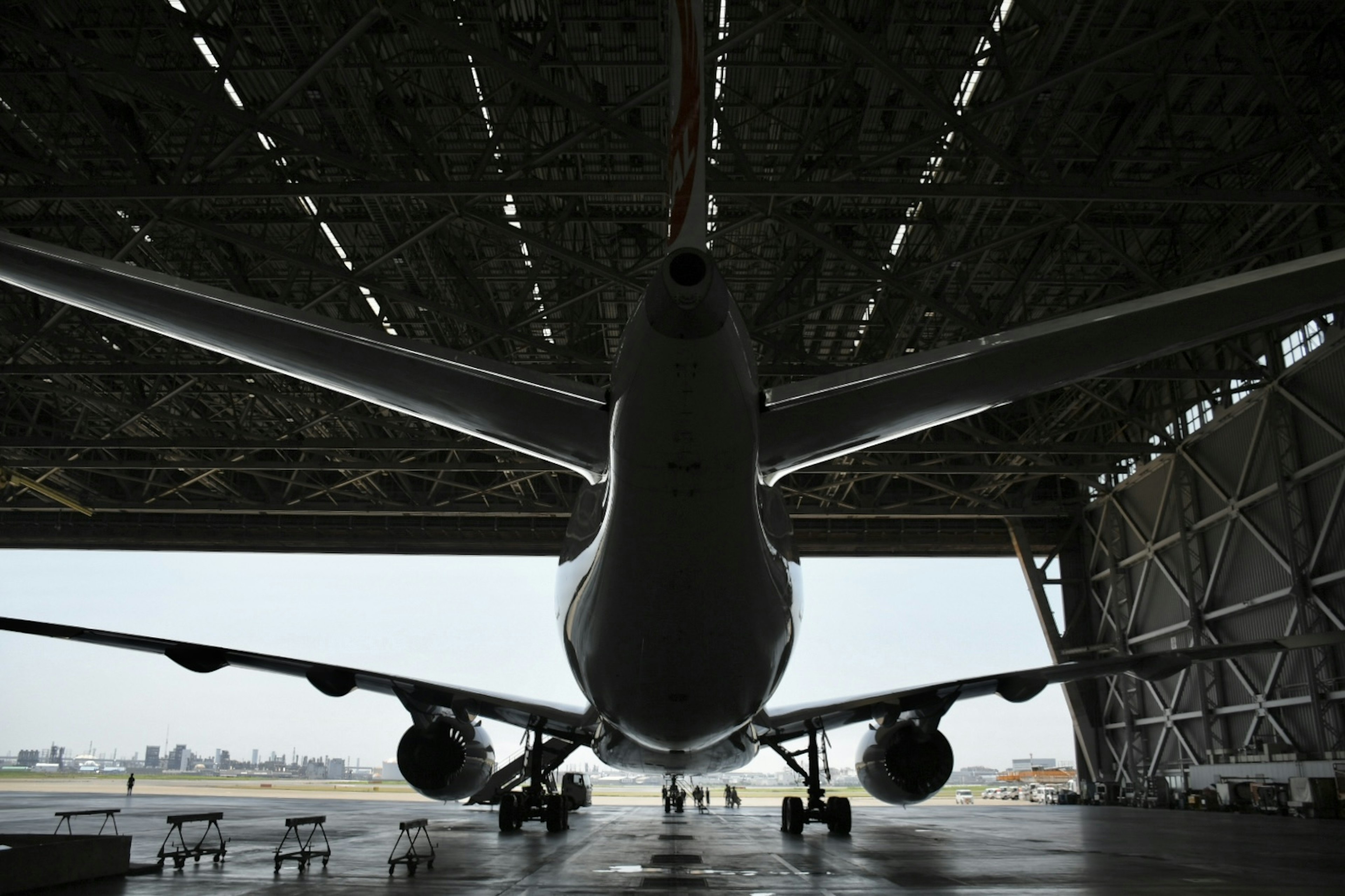 Airplane inside a hangar viewed from the front