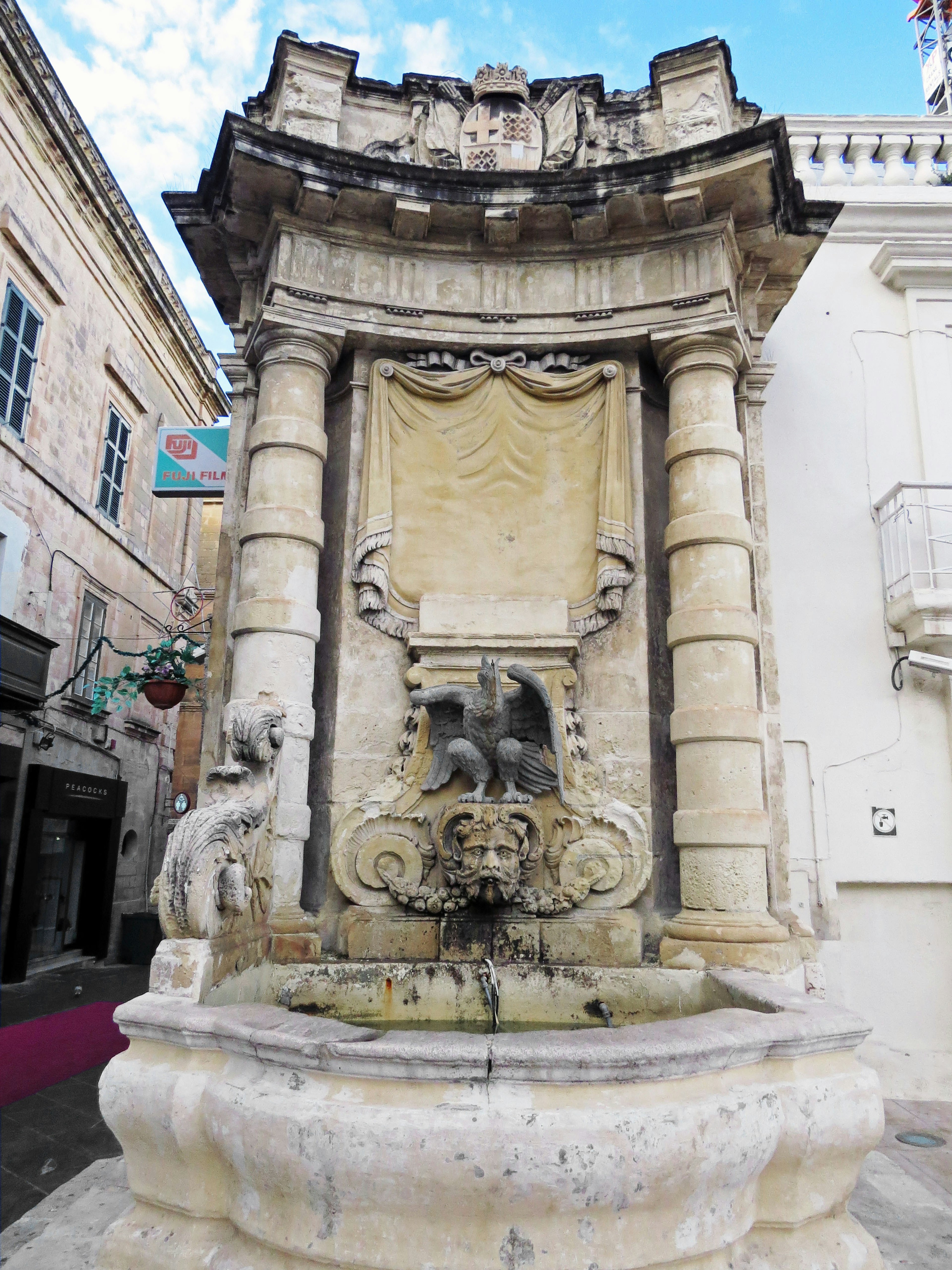 Beautiful stone fountain featuring a lion sculpture and decorative design