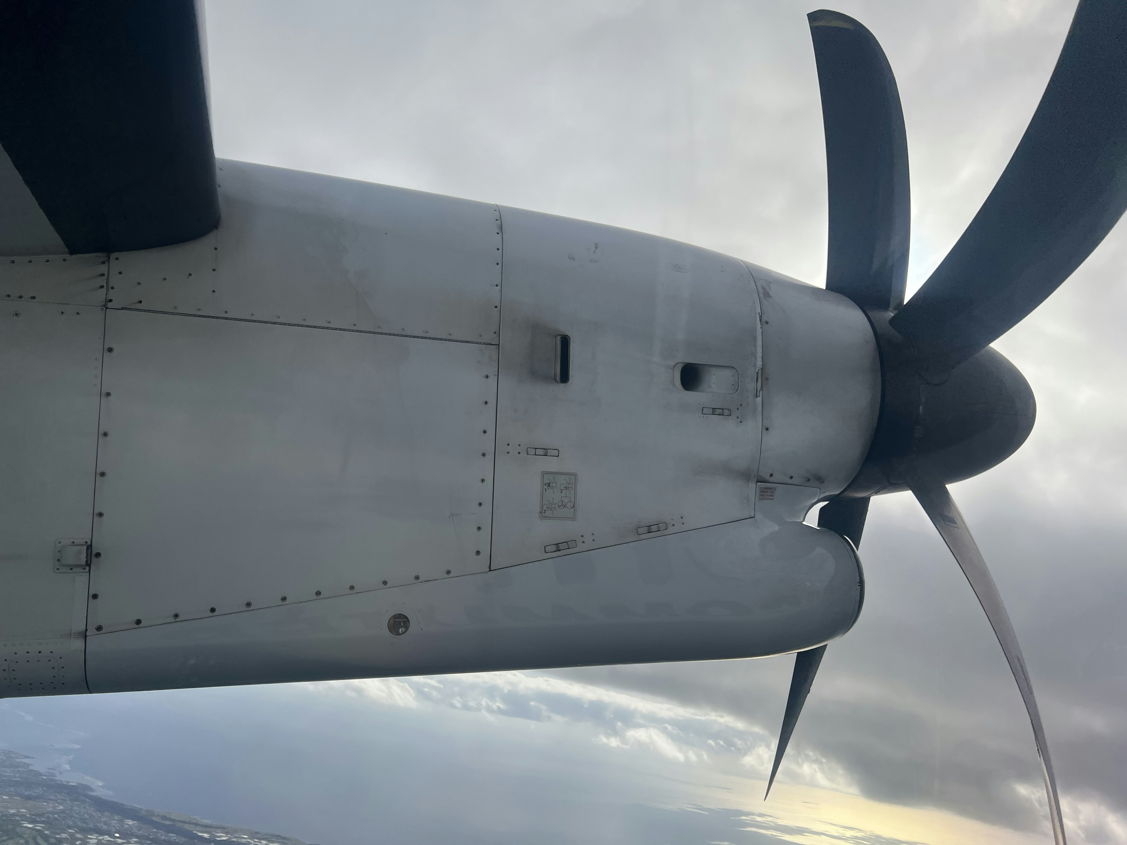 Close-up of an aircraft propeller and engine side