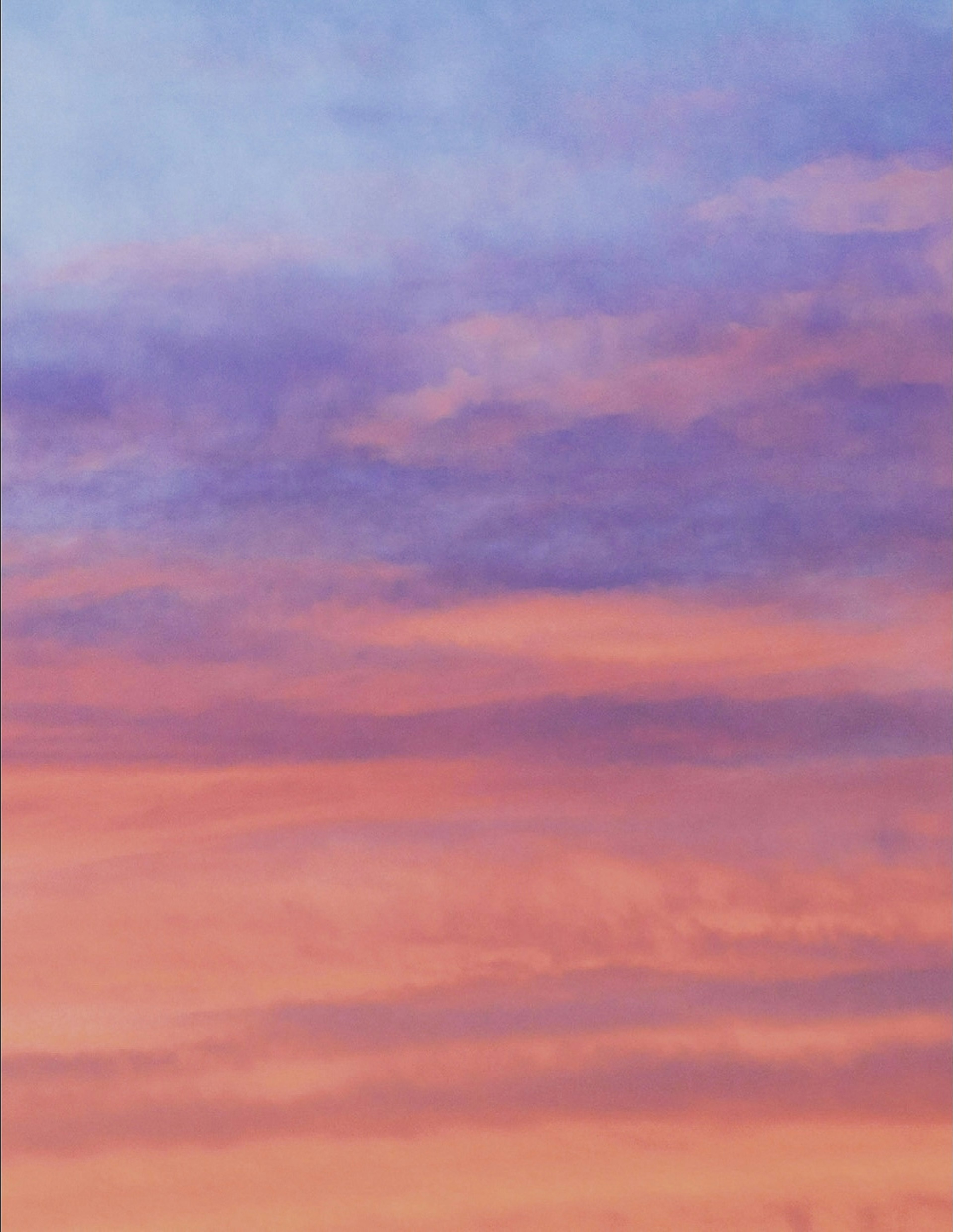 A beautiful sunset sky with shades of purple and orange blending together