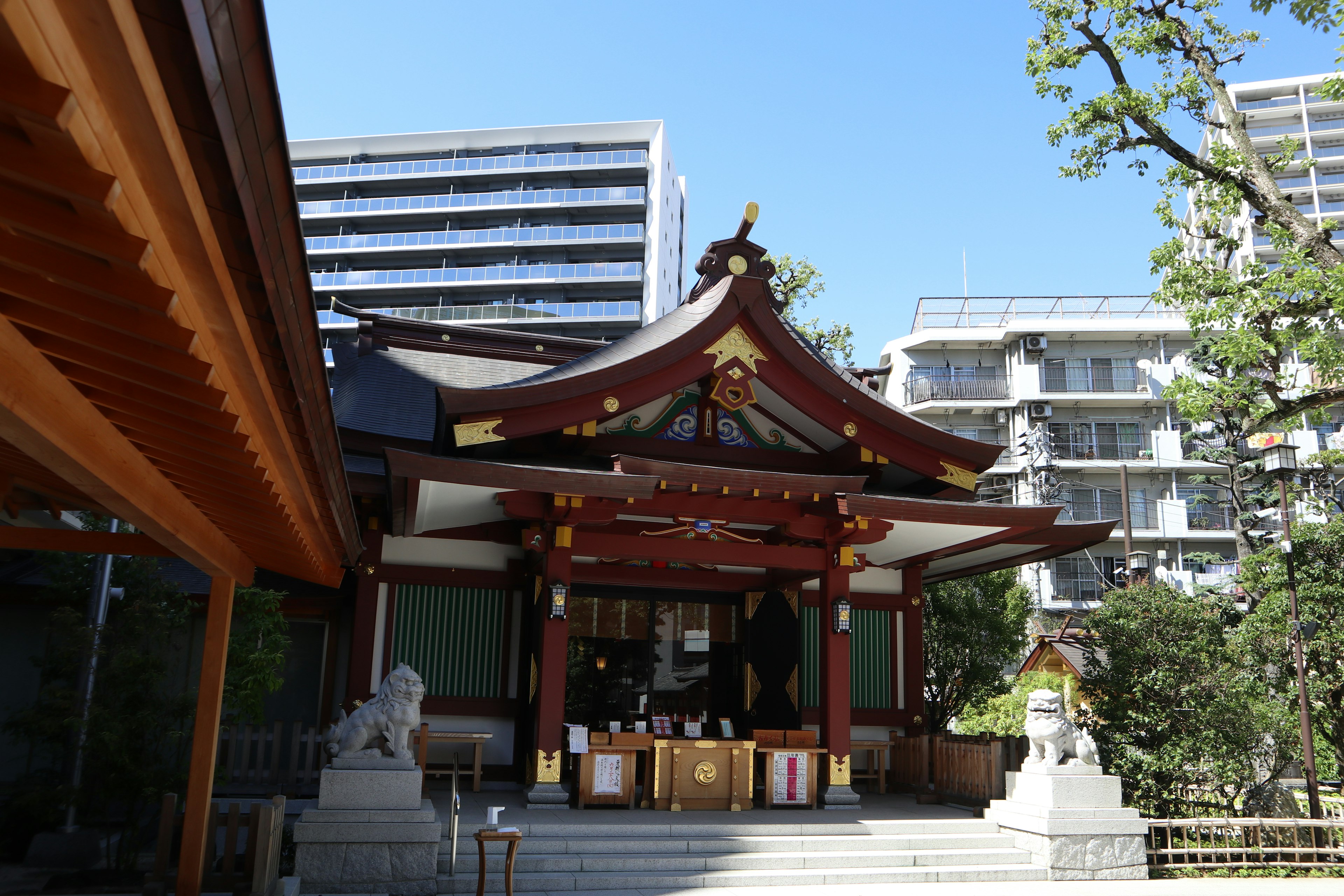 Beautiful shrine architecture contrasted with modern buildings