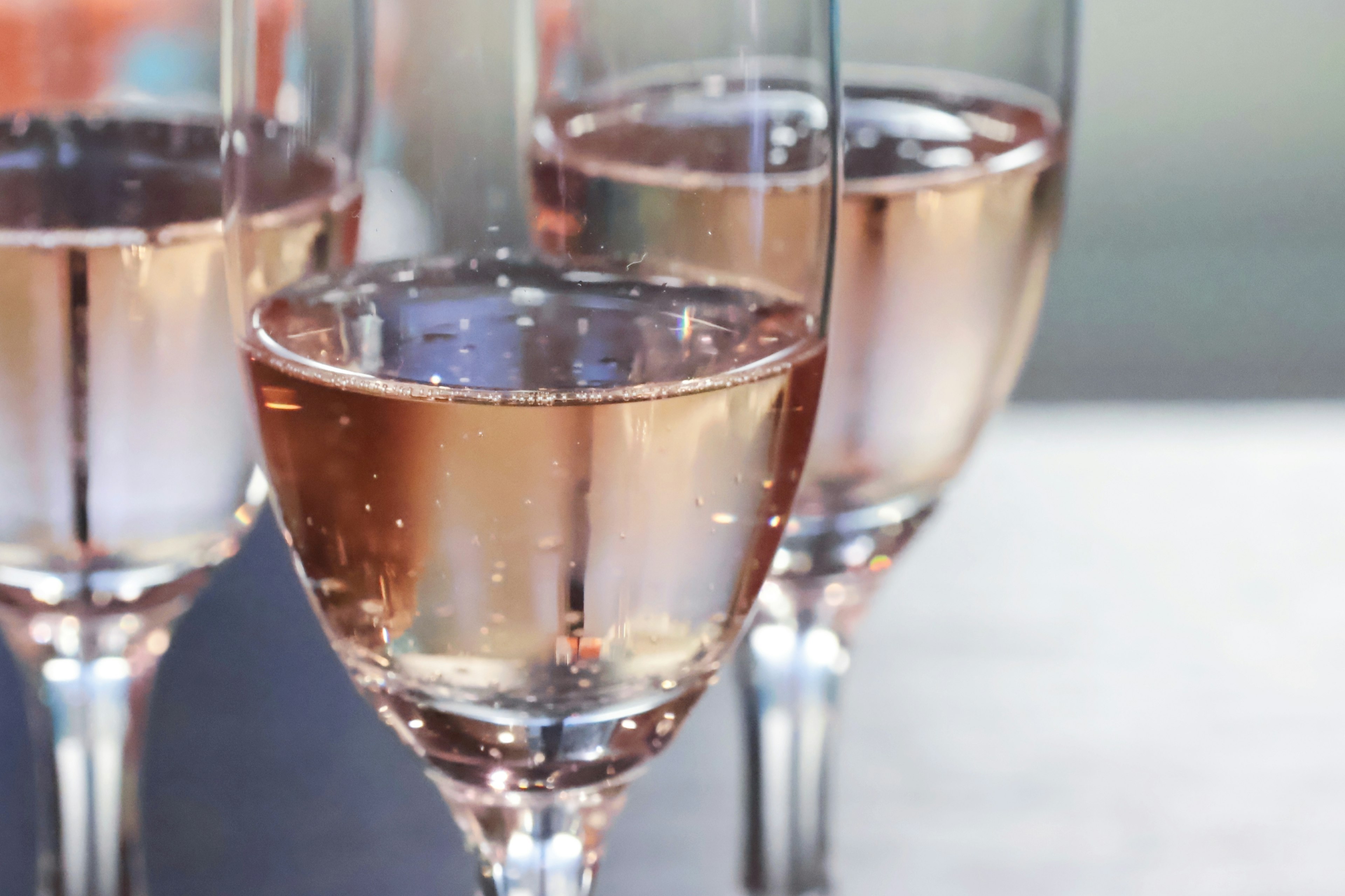 Close-up of glasses filled with rosé wine