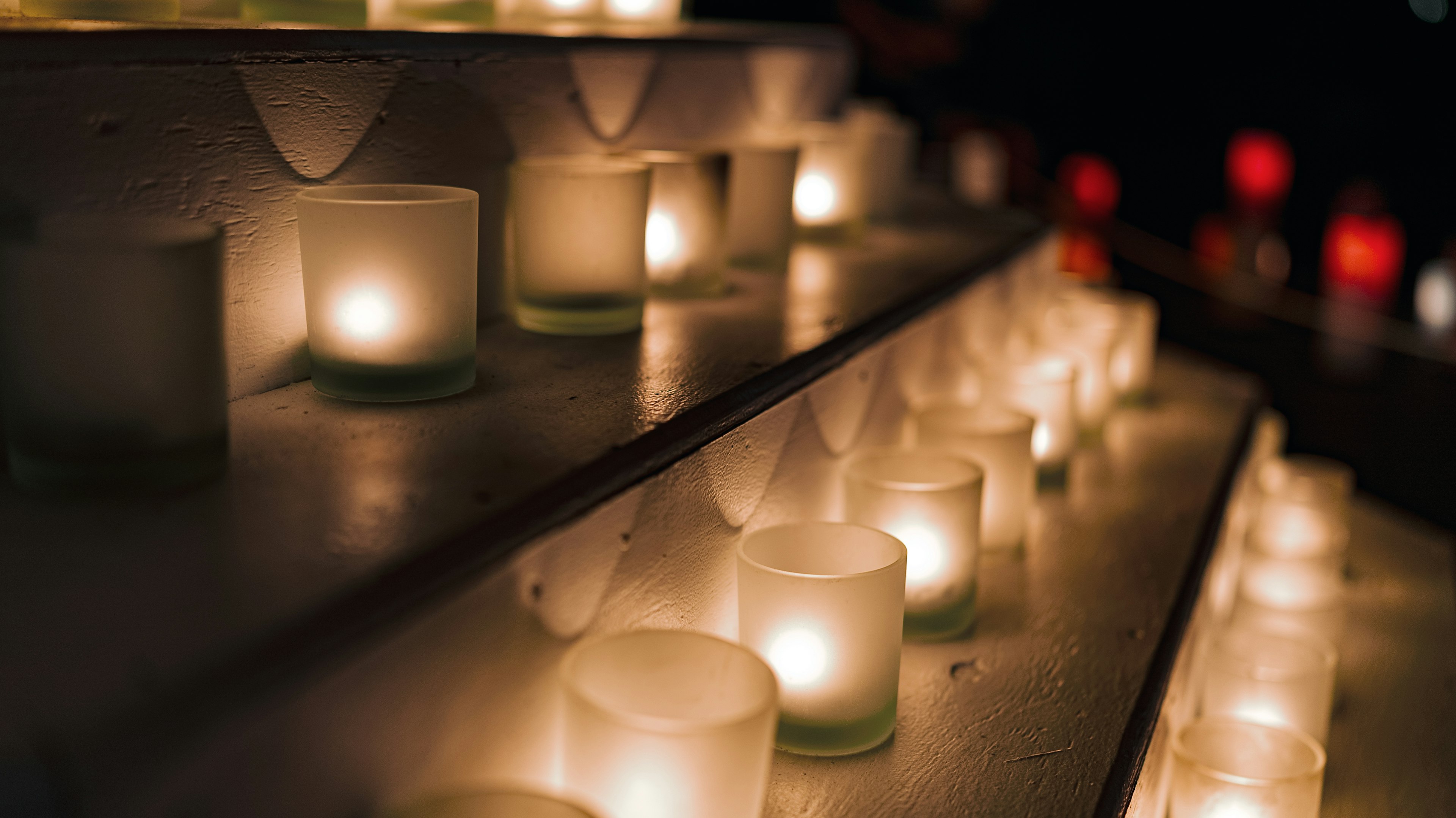 Warm ambiance created by candles arranged on steps