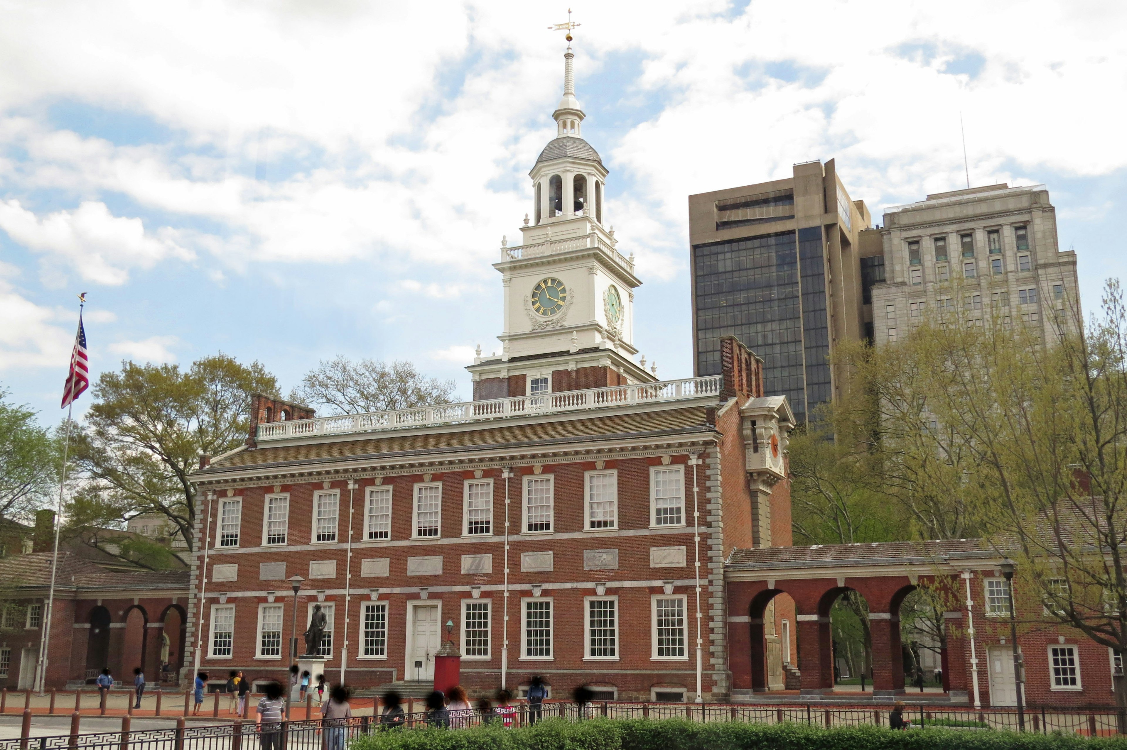 Independence Hall featuring historic architecture alongside modern skyscrapers