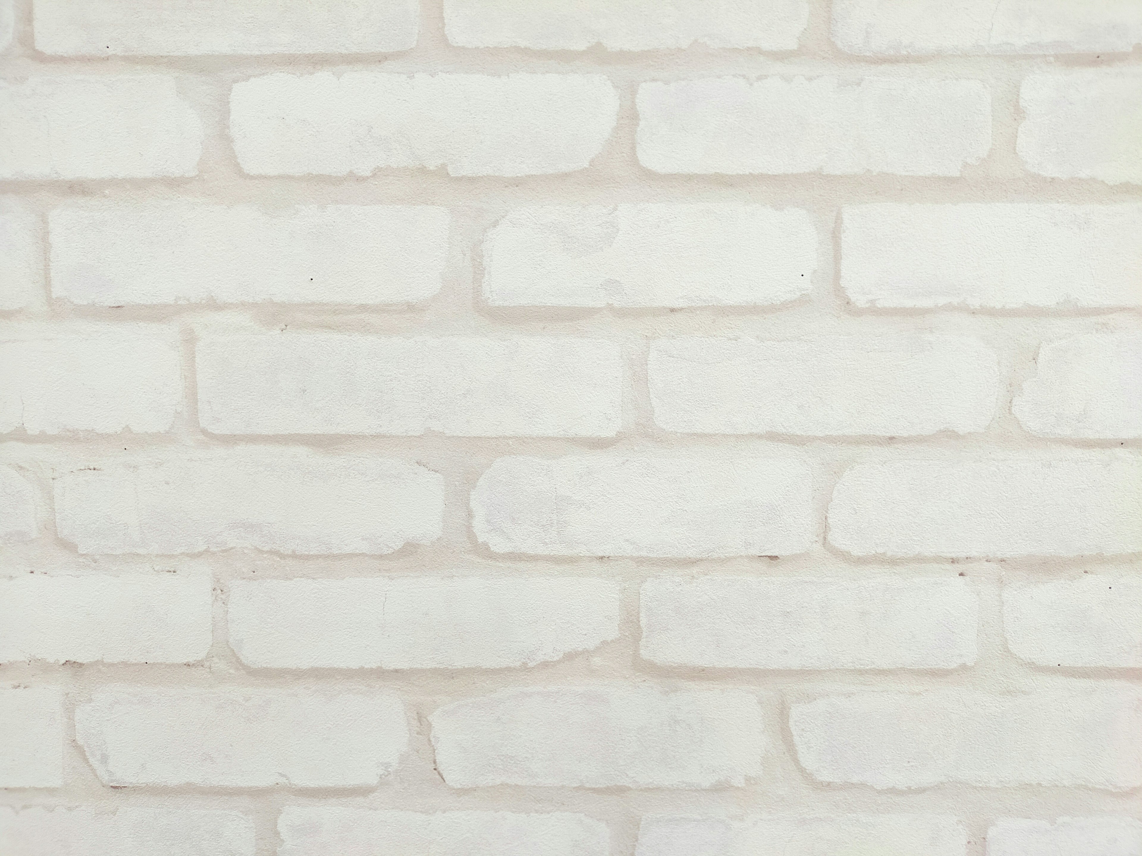 Textured white brick wall