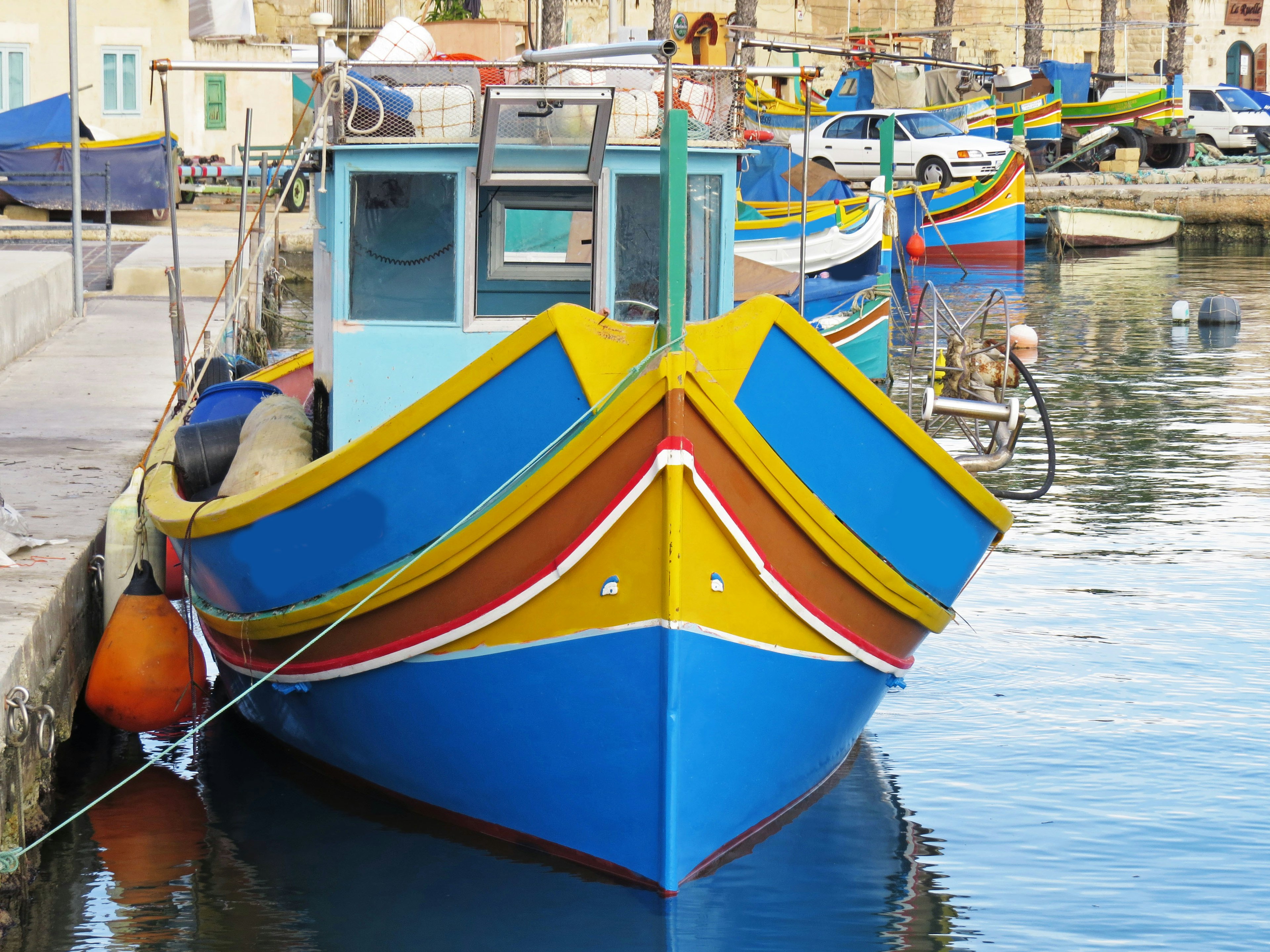 Colorful boat docked at the harbor