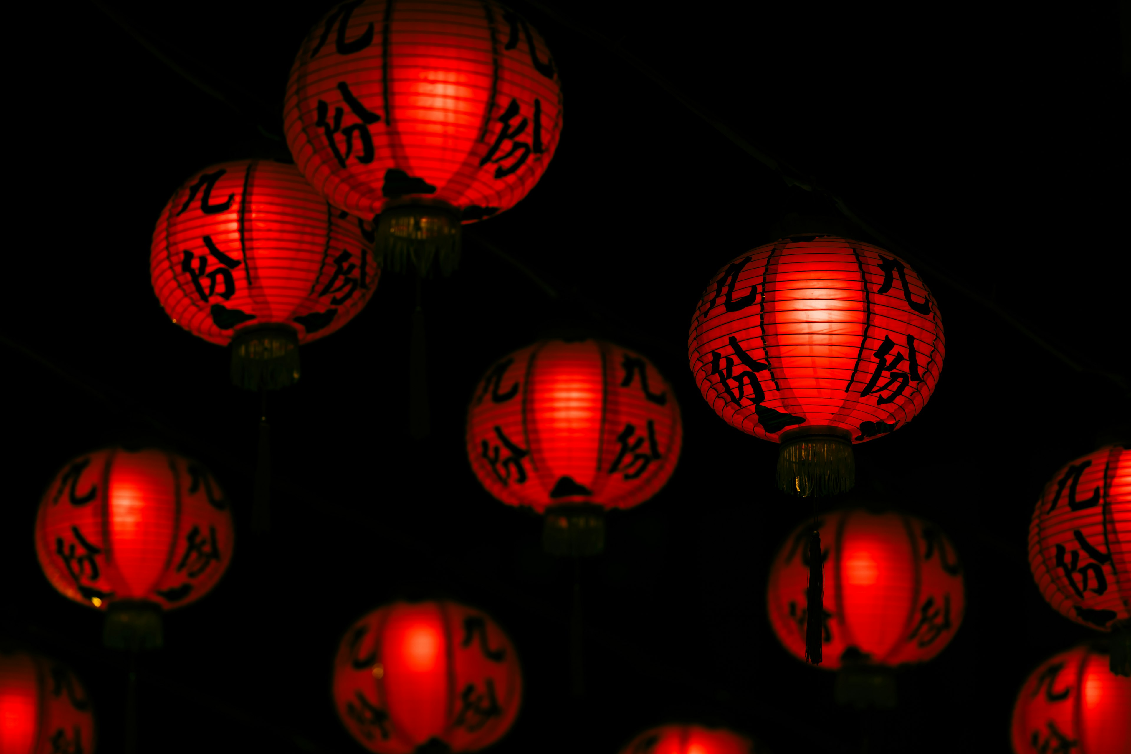 Red lanterns glowing in the dark