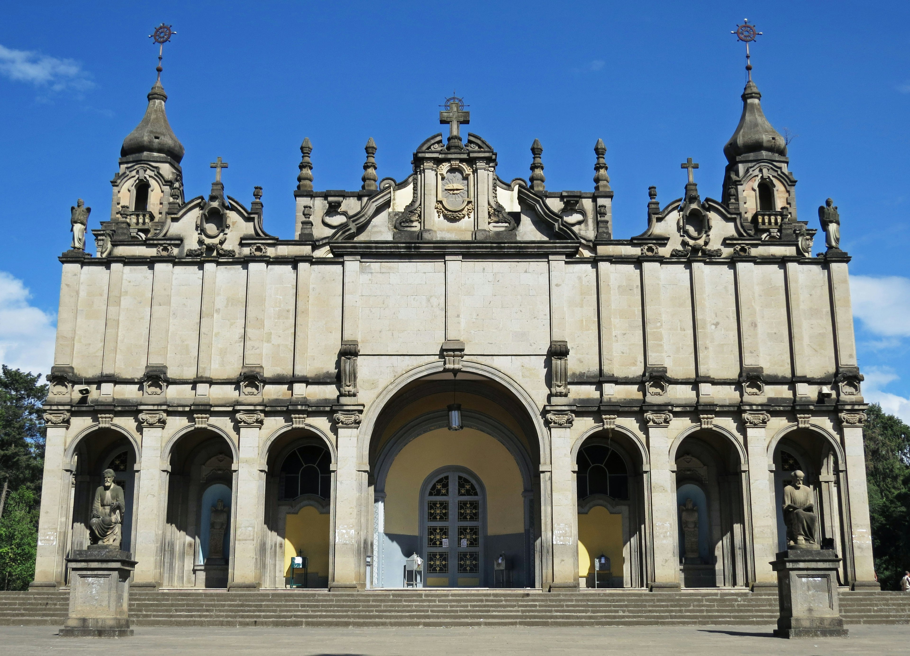 Exterior of a beautiful historic building featuring columns and sculptures