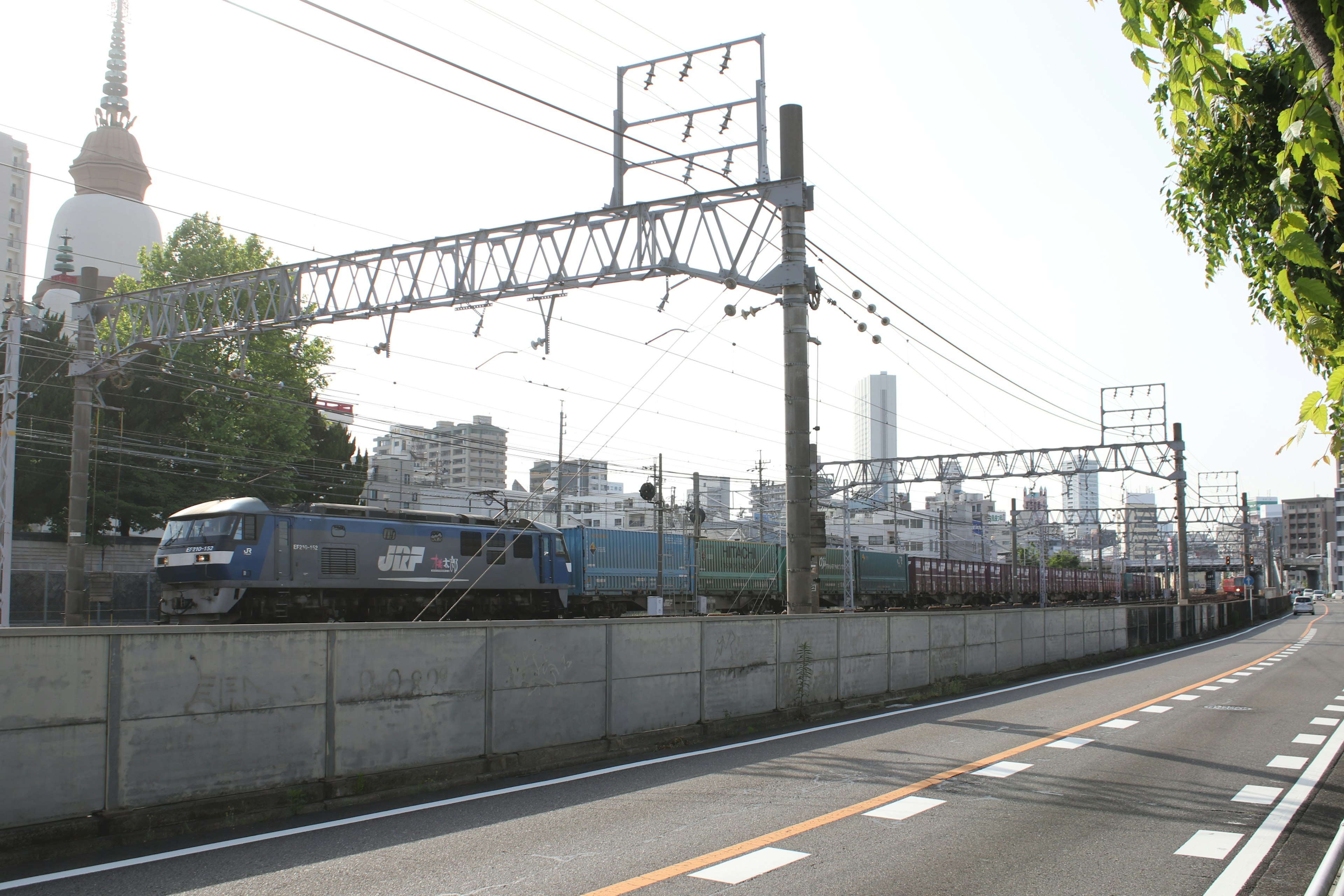 Urban landscape featuring a train and skyscrapers in Tokyo